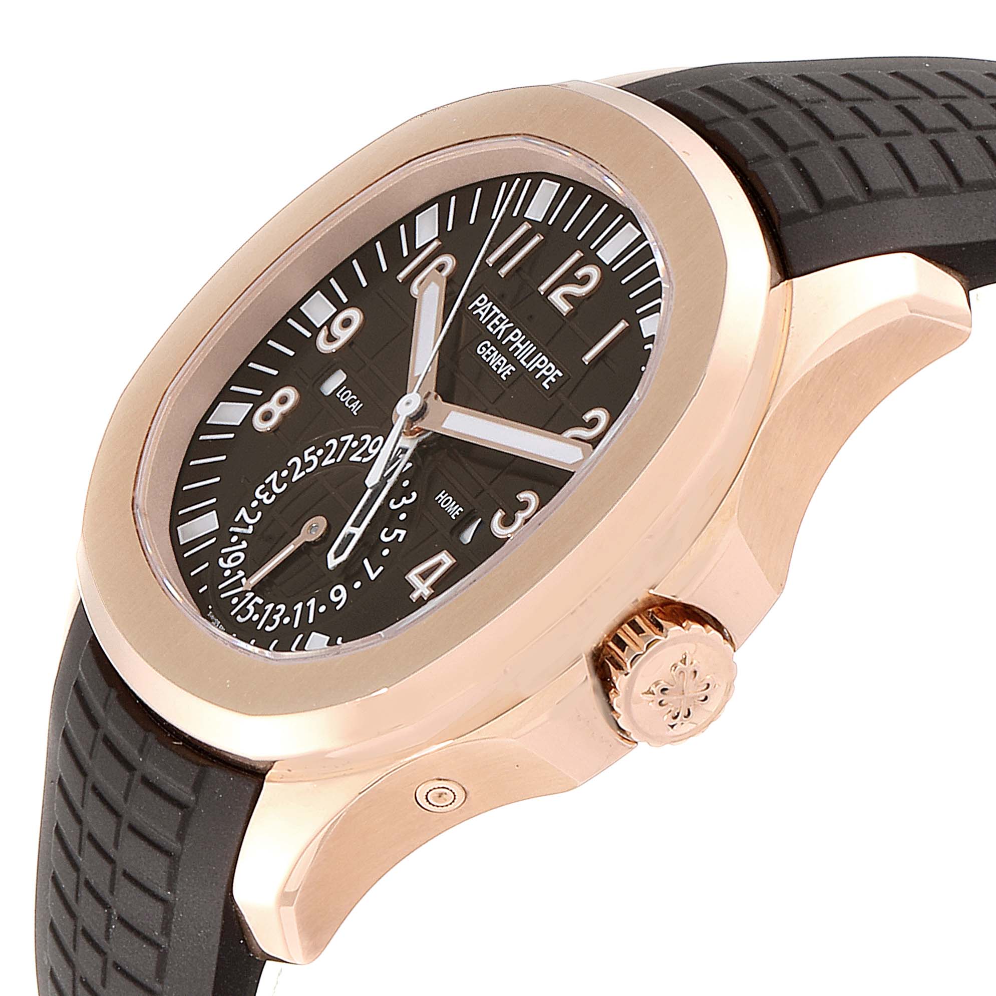 The image shows an angled close-up of the Patek Philippe Aquanaut 5164R Men's Rose Gold Brown Dial 5164R Men's Rose Gold Brown Dial, featuring the watch face, crown, and part of the strap.