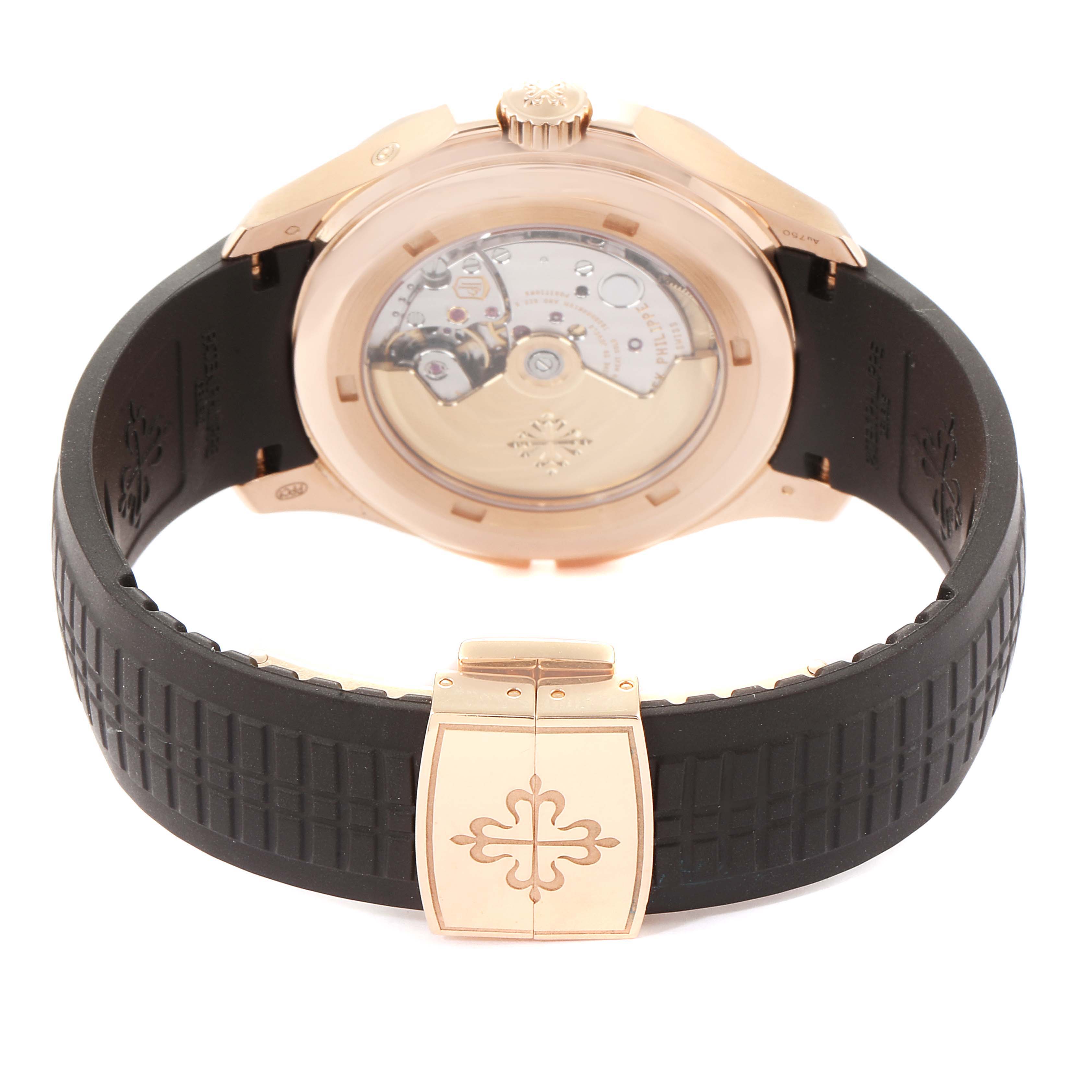The image shows the back view of a Patek Philippe Aquanaut 5164R Men's Rose Gold Brown Dial 5164R Men's Rose Gold Brown Dial watch, highlighting its strap, deployment clasp, and movement.