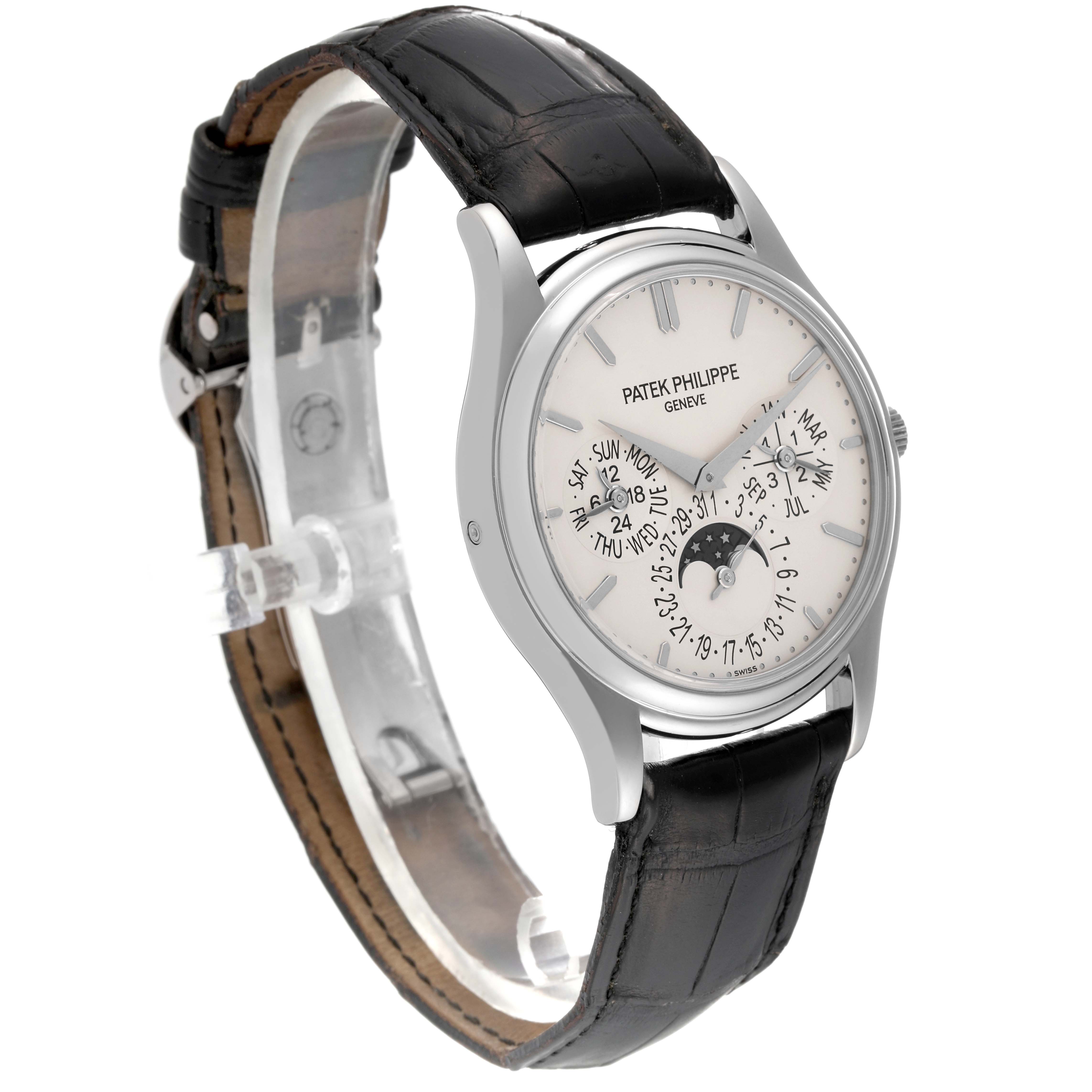 The image shows a Patek Philippe Calatrava 5140G-001 Men
s White Gold Silver Dial 5140G-001 Men
s White Gold Silver Dial watch at a slight angle, displaying its face and black leather strap.