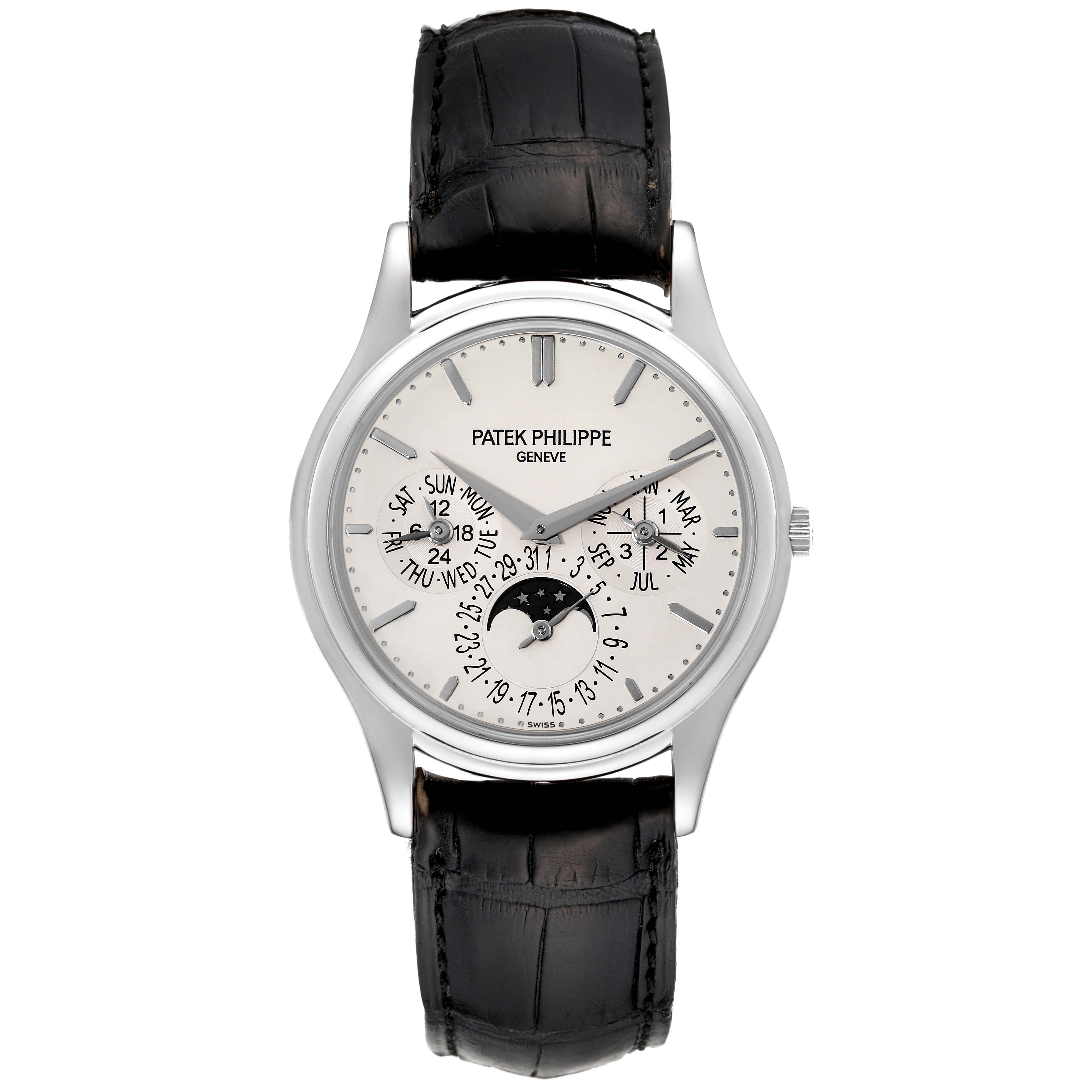 The Patek Philippe Calatrava 5140G-001 Men
s White Gold Silver Dial 5140G-001 Men
s White Gold Silver Dial watch is shown from the front, displaying its face, black strap, and moon phase indicator.