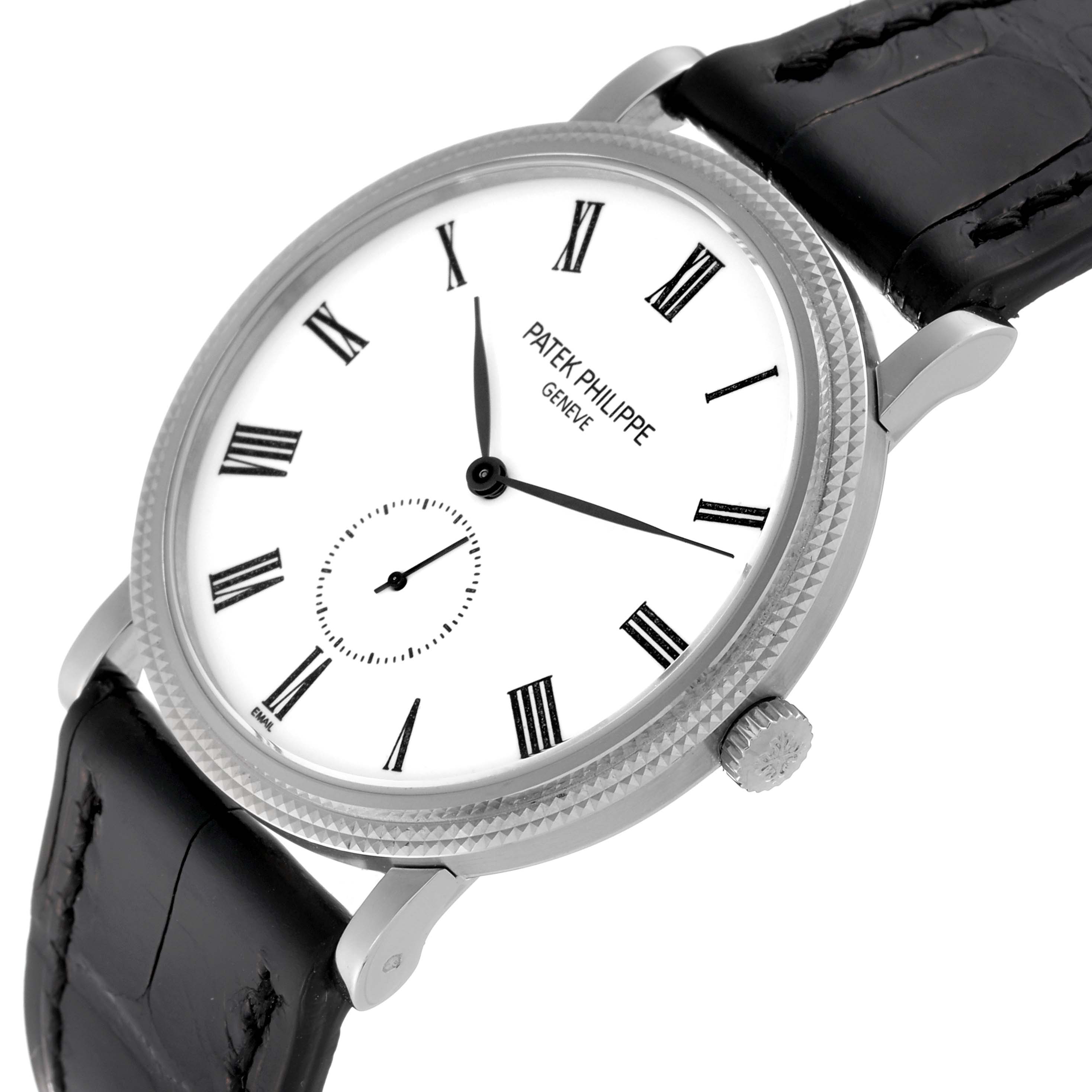 The image shows a Patek Philippe Calatrava 5116G Men
s White Gold White Dial 5116G Men
s White Gold White Dial watch at an angle highlighting its dial, bezel, crown, and leather strap.