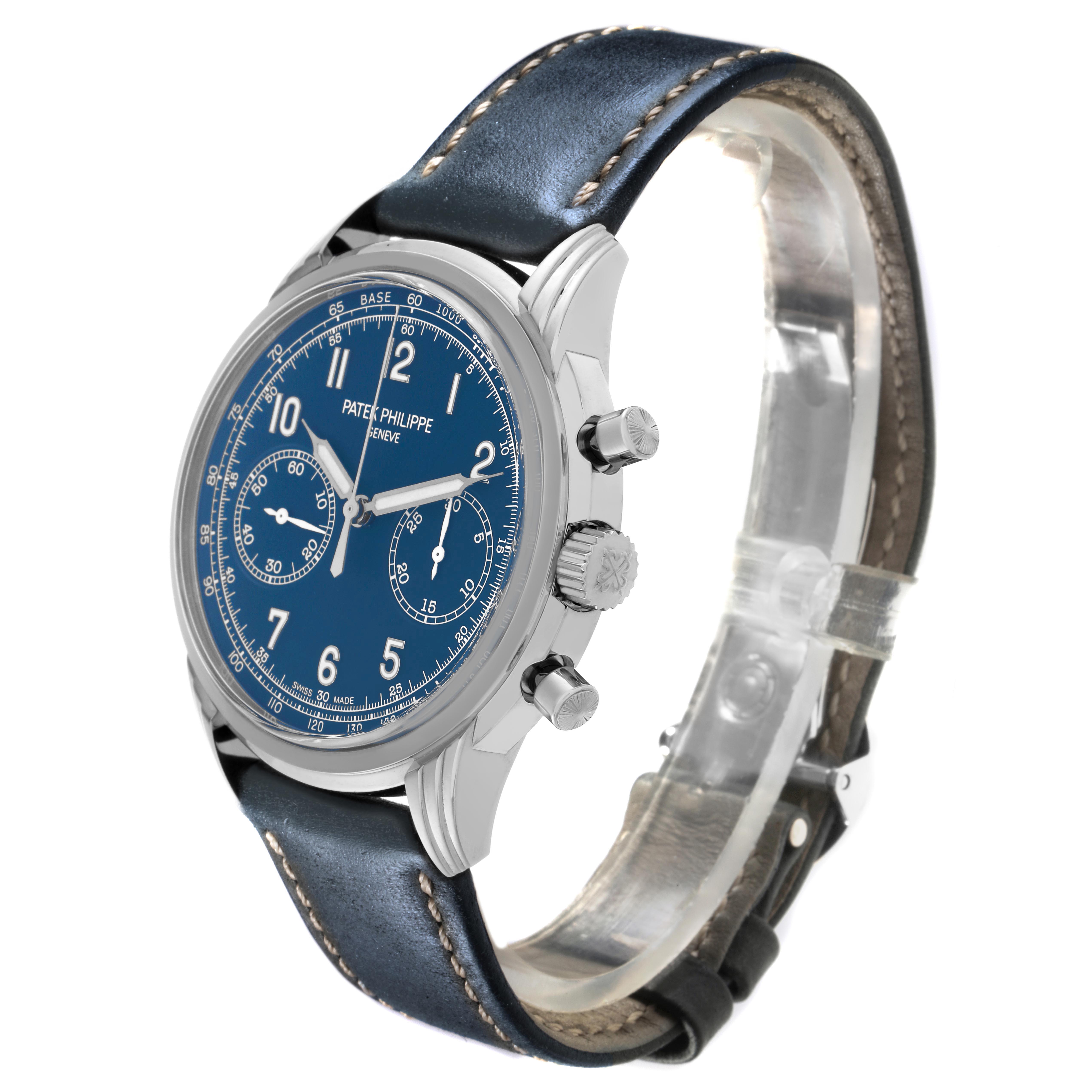 The Patek Philippe Complications 5172G-001 Men
s White Gold Blue Dial 5172G-001 Men
s White Gold Blue Dial model is shown at a slight angle, displaying the dial, crown, pushers, and leather strap.