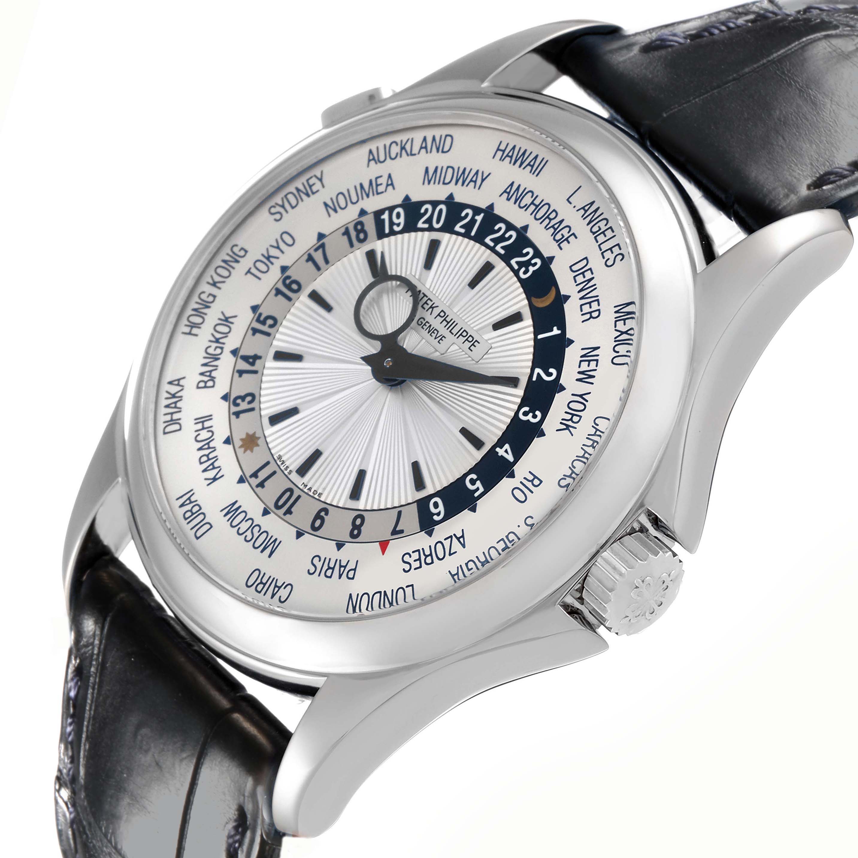 The Patek Philippe Complications 5130G-001 Men
s White Gold Silver Dial 5130G-001 Men
s White Gold Silver Dial watch is shown at an angle highlighting the dial, case, crown, and part of the strap.