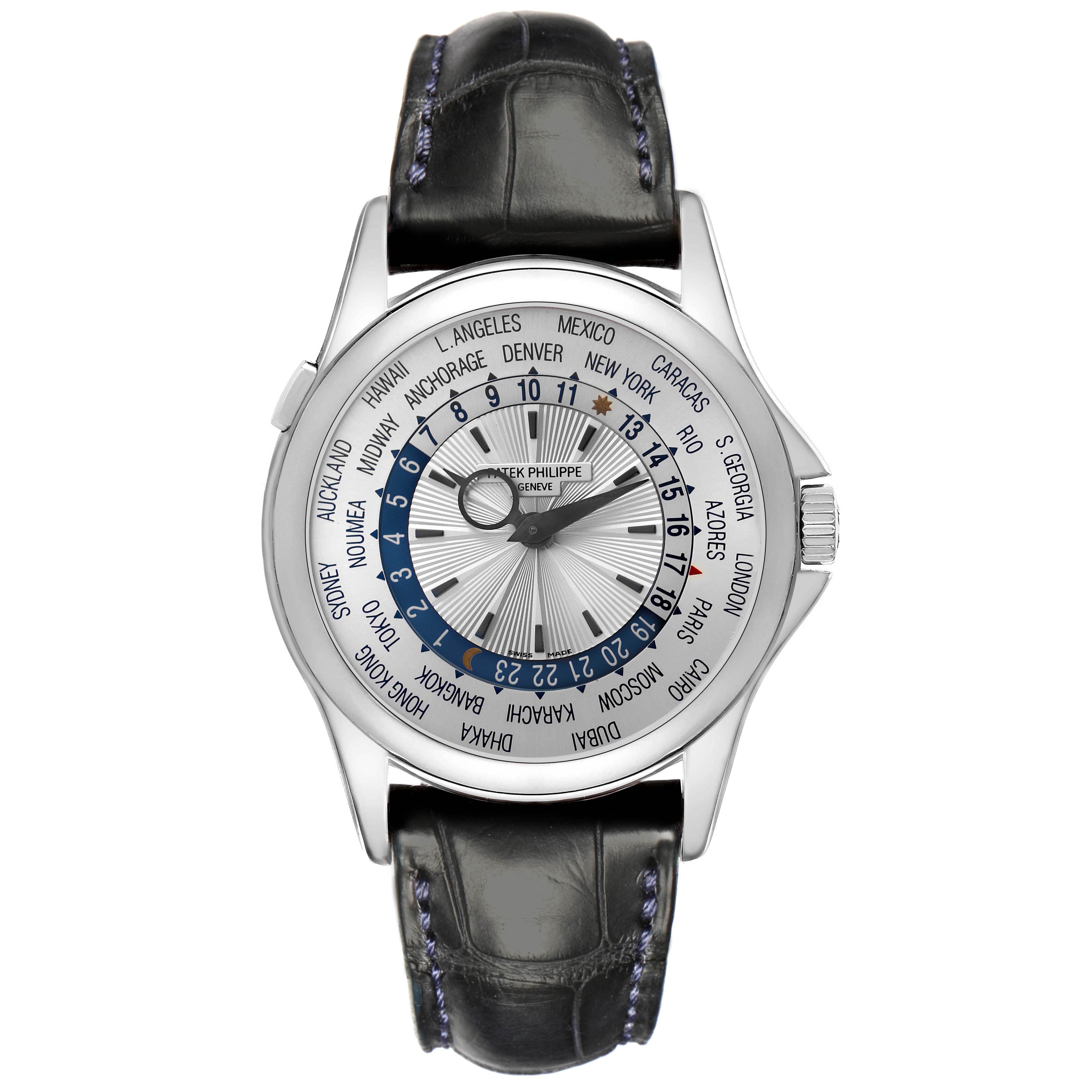 The Patek Philippe Complications 5130G-001 Men
s White Gold Silver Dial 5130G-001 Men
s White Gold Silver Dial watch is shown from a top-down angle, displaying its dial with cities and time zones clearly visible.