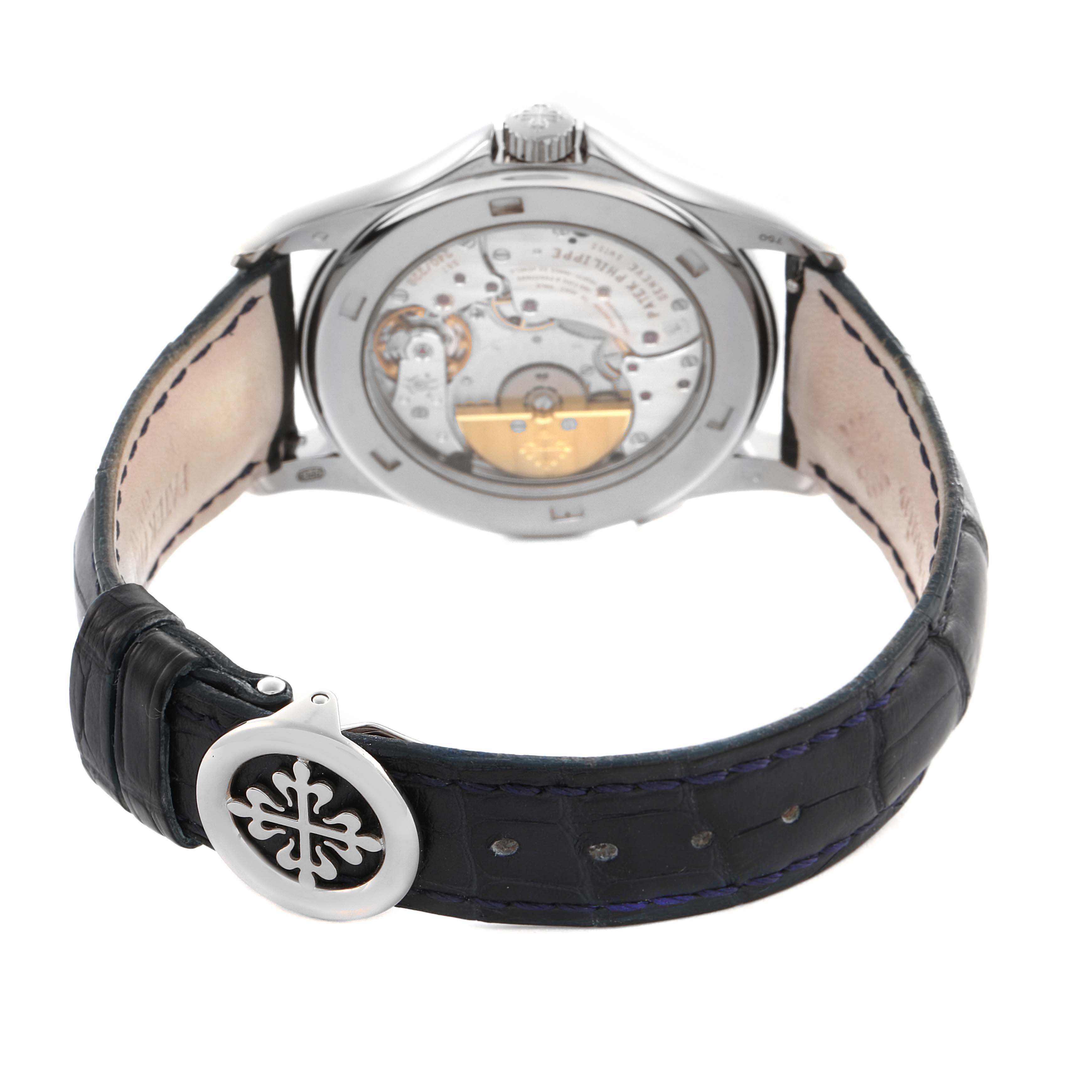 The Patek Philippe Complications 5130G-001 Men
s White Gold Silver Dial 5130G-001 Men
s White Gold Silver Dial model is shown from the back, highlighting the see-through case back and watch movement.