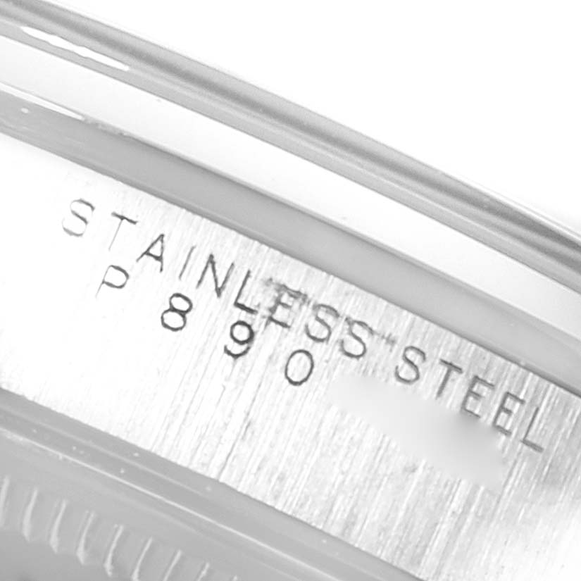 This close-up image shows the stainless steel engraving and serial number on the side of a Rolex Air-King 14000 Men's Stainless Steel Black Dial 14000 Men's Stainless Steel Black Dial watch.
