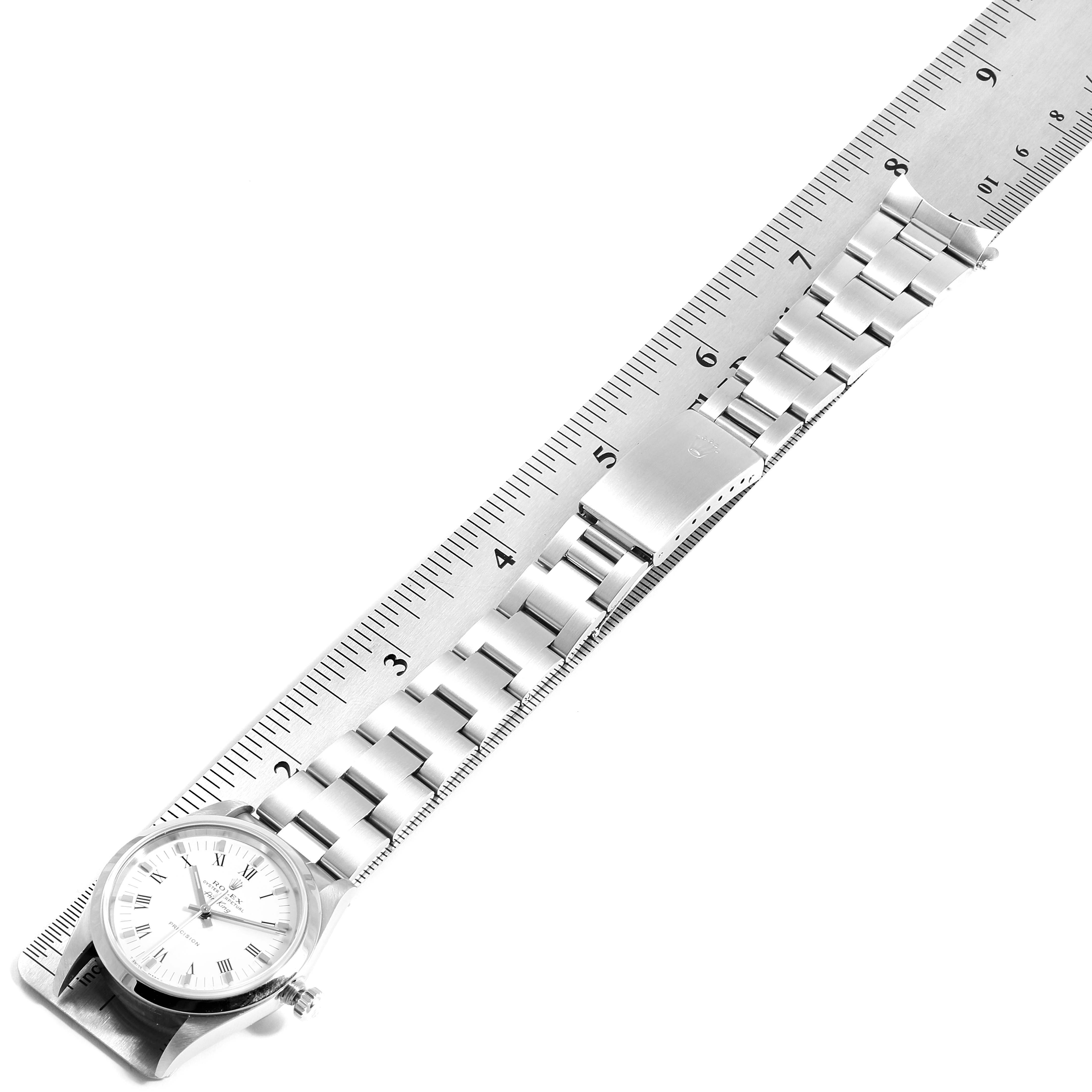 The image shows a Rolex Air-King 14000 Men's Stainless Steel White Dial 14000 Men's Stainless Steel White Dial watch laid flat with its stainless steel strap next to a measuring ruler.