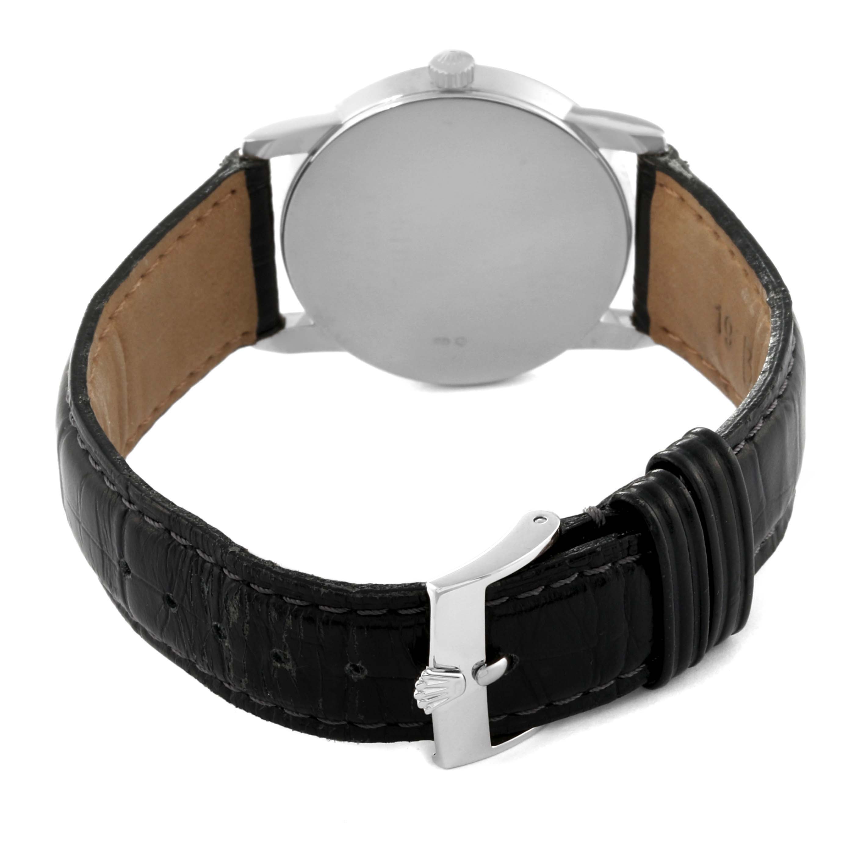 The image shows the back of a Rolex Cellini 5116/9 Men's White Gold Silver Dial 5116/9 Men's White Gold Silver Dial watch, highlighting the strap, buckle, and case back.