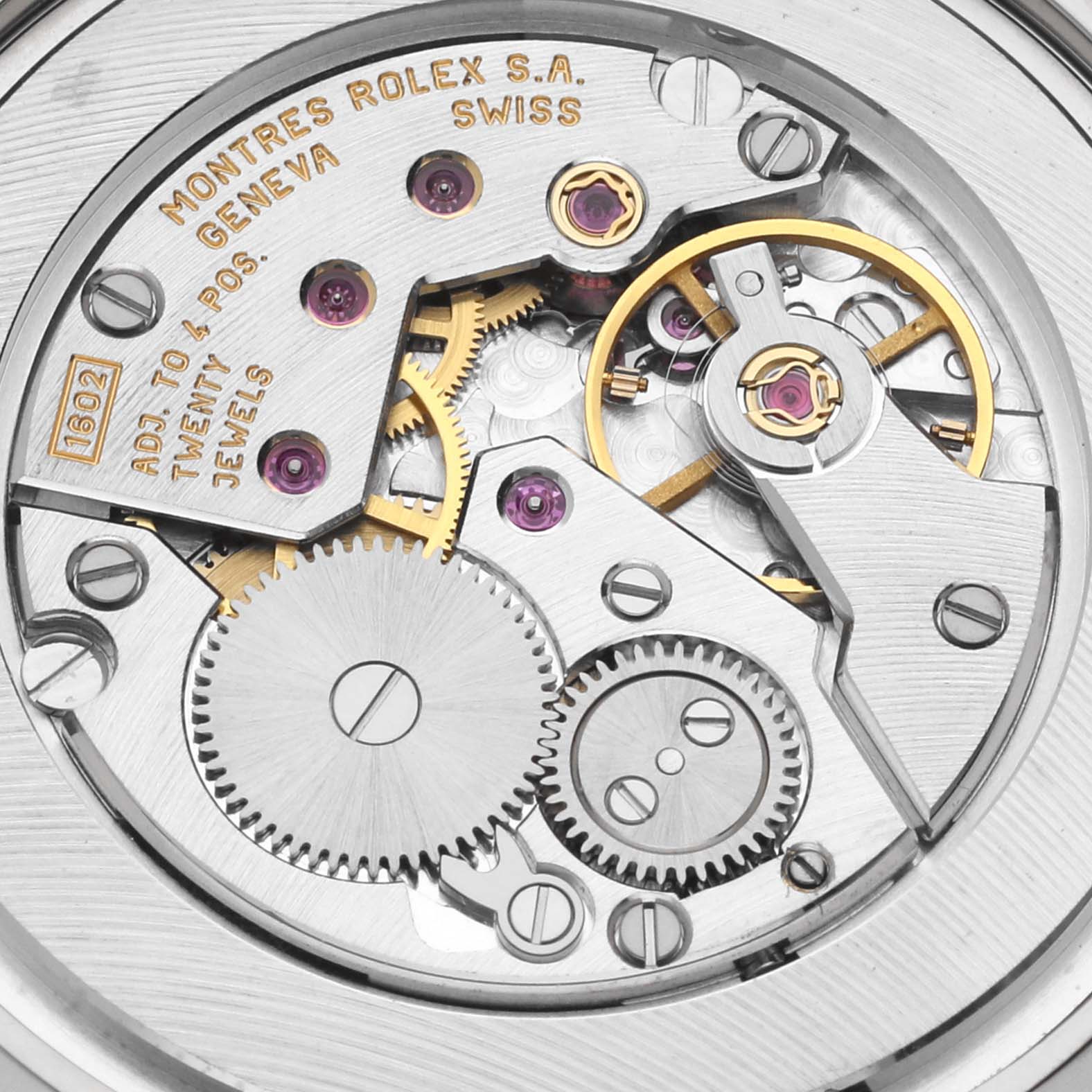 This Rolex Cellini 5116/9 Men's White Gold Silver Dial 5116/9 Men's White Gold Silver Dial watch image shows the detailed inner movement mechanism from a close-up back view.