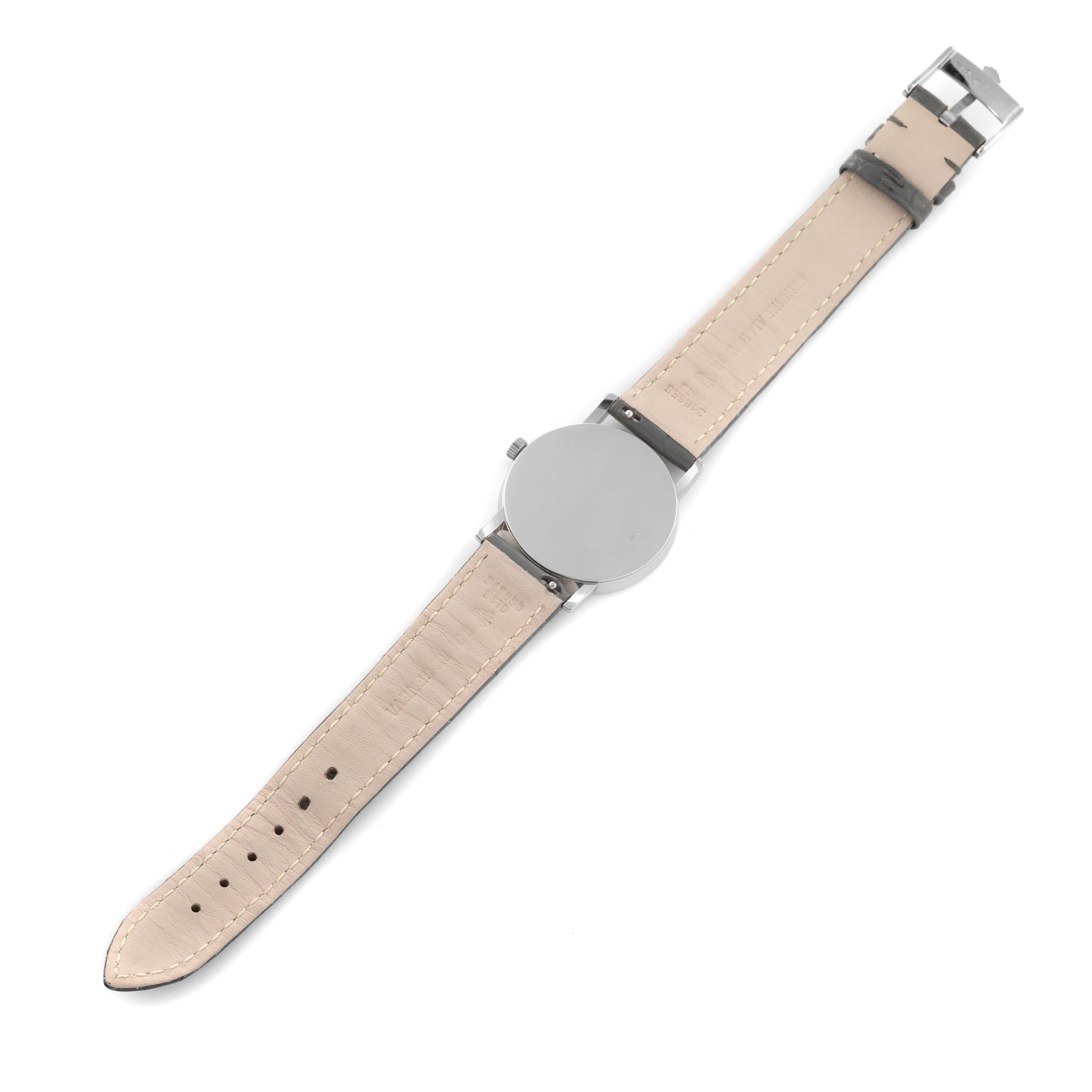 The Rolex Cellini 5115/9 Men's White Gold Silver Dial 5115/9 Men's White Gold Silver Dial watch is shown from the back, displaying its case and leather strap laid flat.