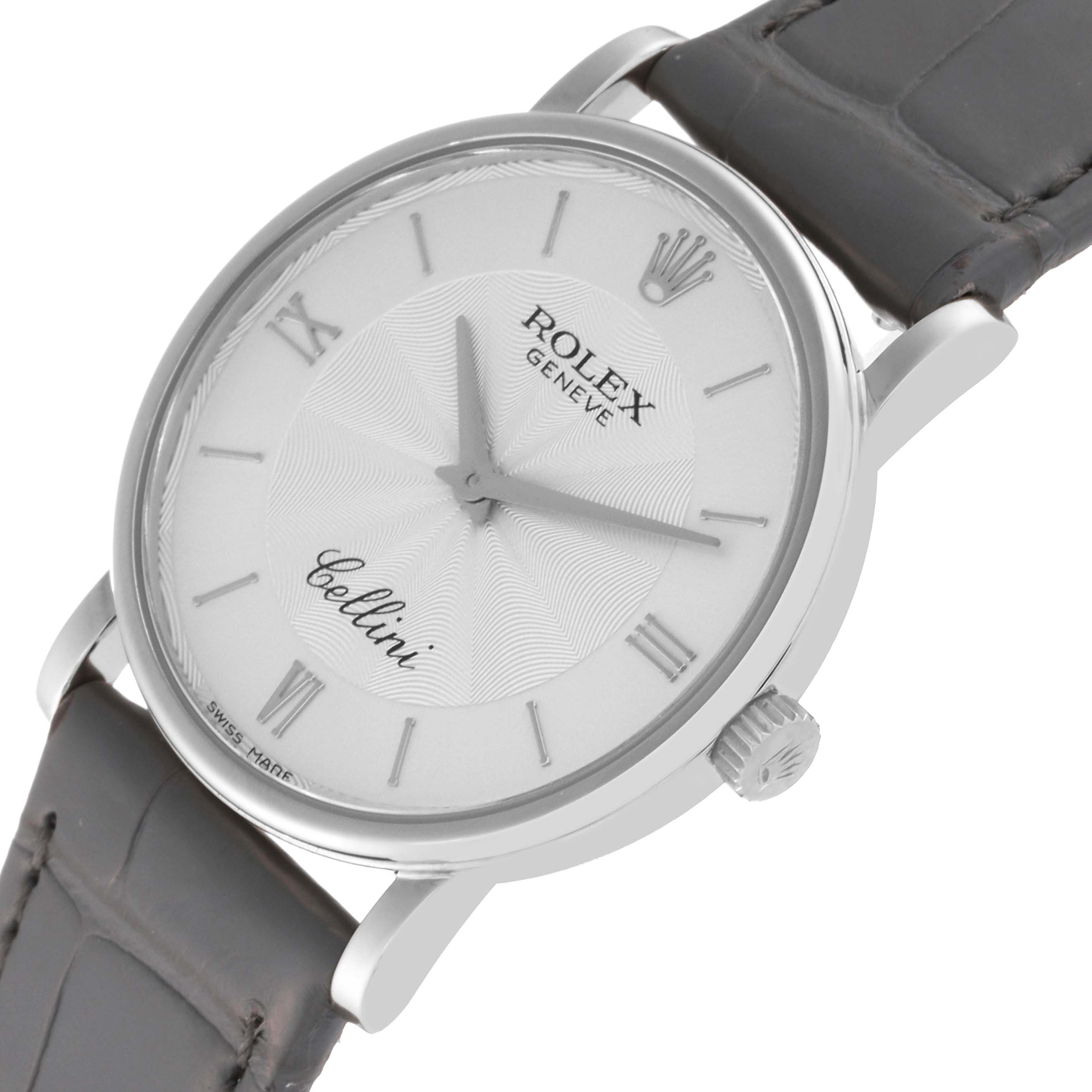 The Rolex Cellini 5115/9 Men's White Gold Silver Dial 5115/9 Men's White Gold Silver Dial watch is shown at a slight angle, highlighting the dial, crown, and strap attachment.