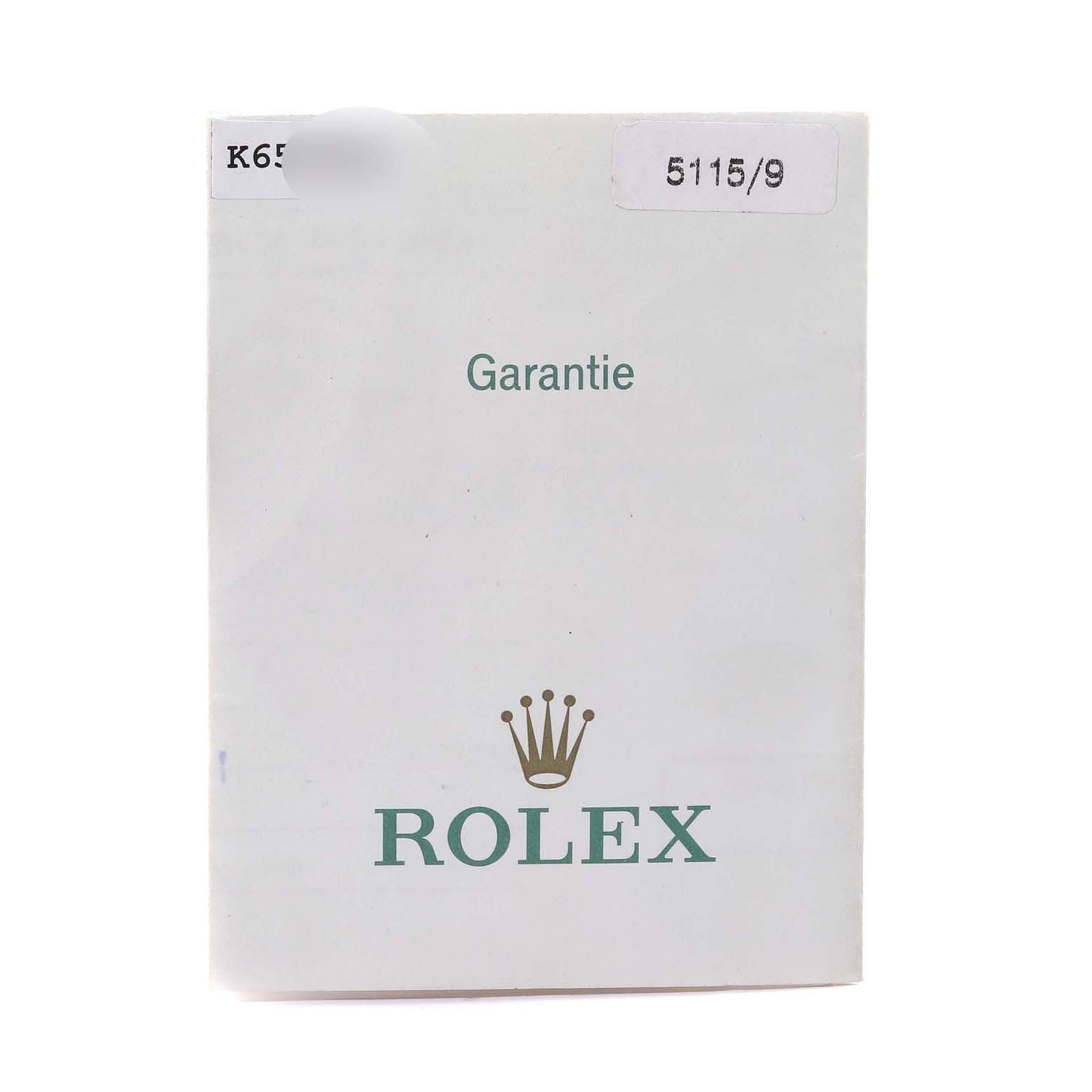 The image shows a close-up of the warranty card for a Rolex Cellini 5115/9 Men's White Gold Silver Dial 5115/9 Men's White Gold Silver Dial watch.