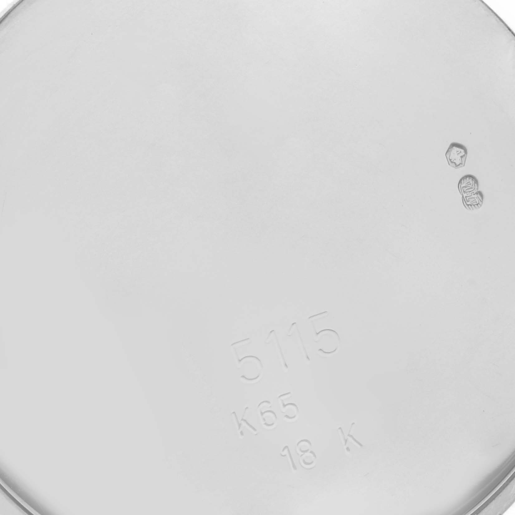 This image shows the interior case back of the Rolex Cellini 5115/9 Men's White Gold Silver Dial 5115/9 Men's White Gold Silver Dial model, displaying the model number and metal content markings.