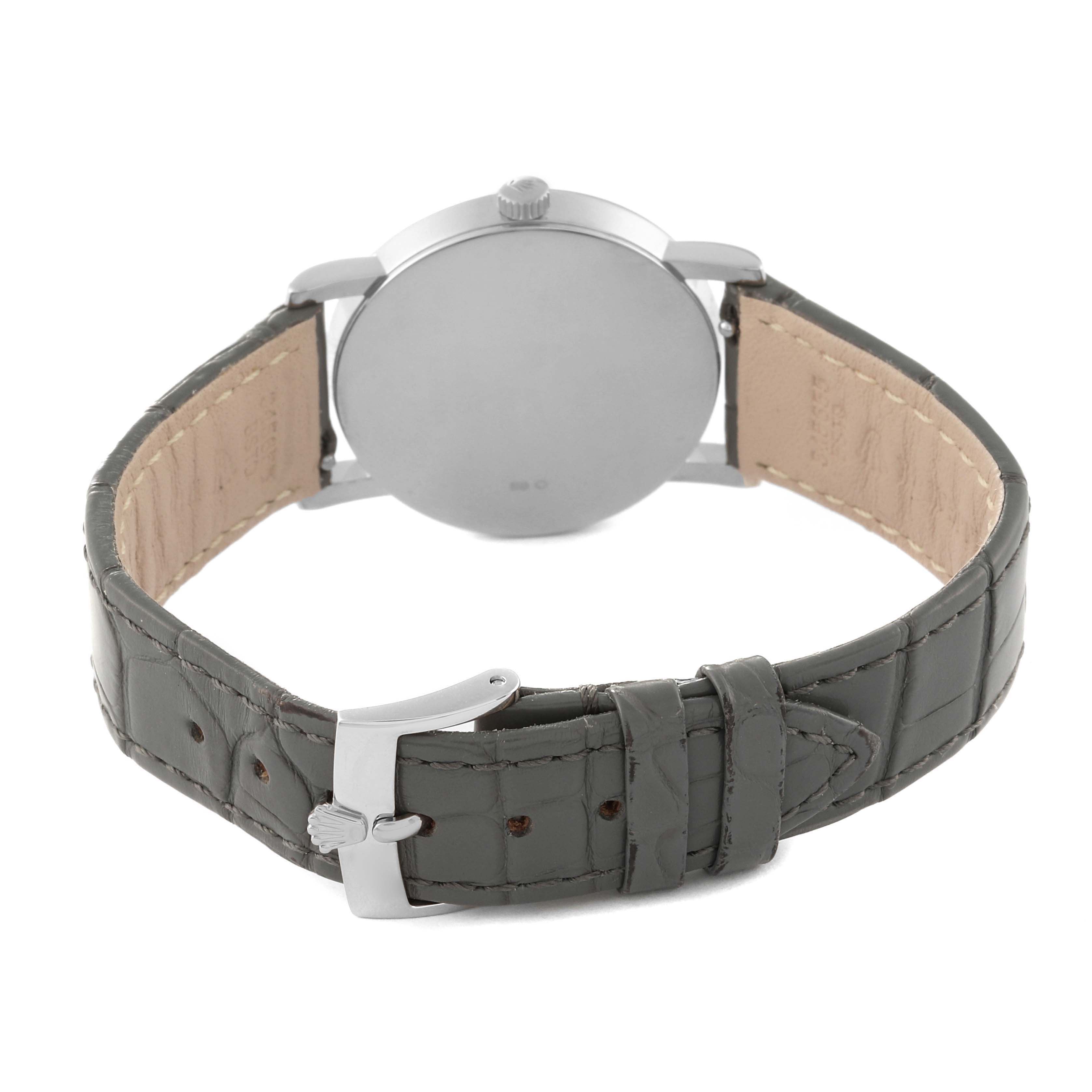 The image shows the back view of a Rolex Cellini 5115/9 Men's White Gold Silver Dial 5115/9 Men's White Gold Silver Dial watch with focus on its leather strap and buckle.