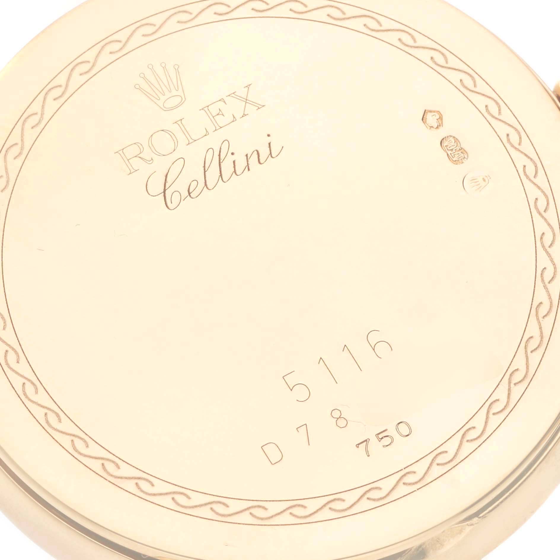 The image shows the back case of a Rolex Cellini 5116 Men's Yellow Gold Champagne Dial 5116 Men's Yellow Gold Champagne Dial watch with engraved details and markings.