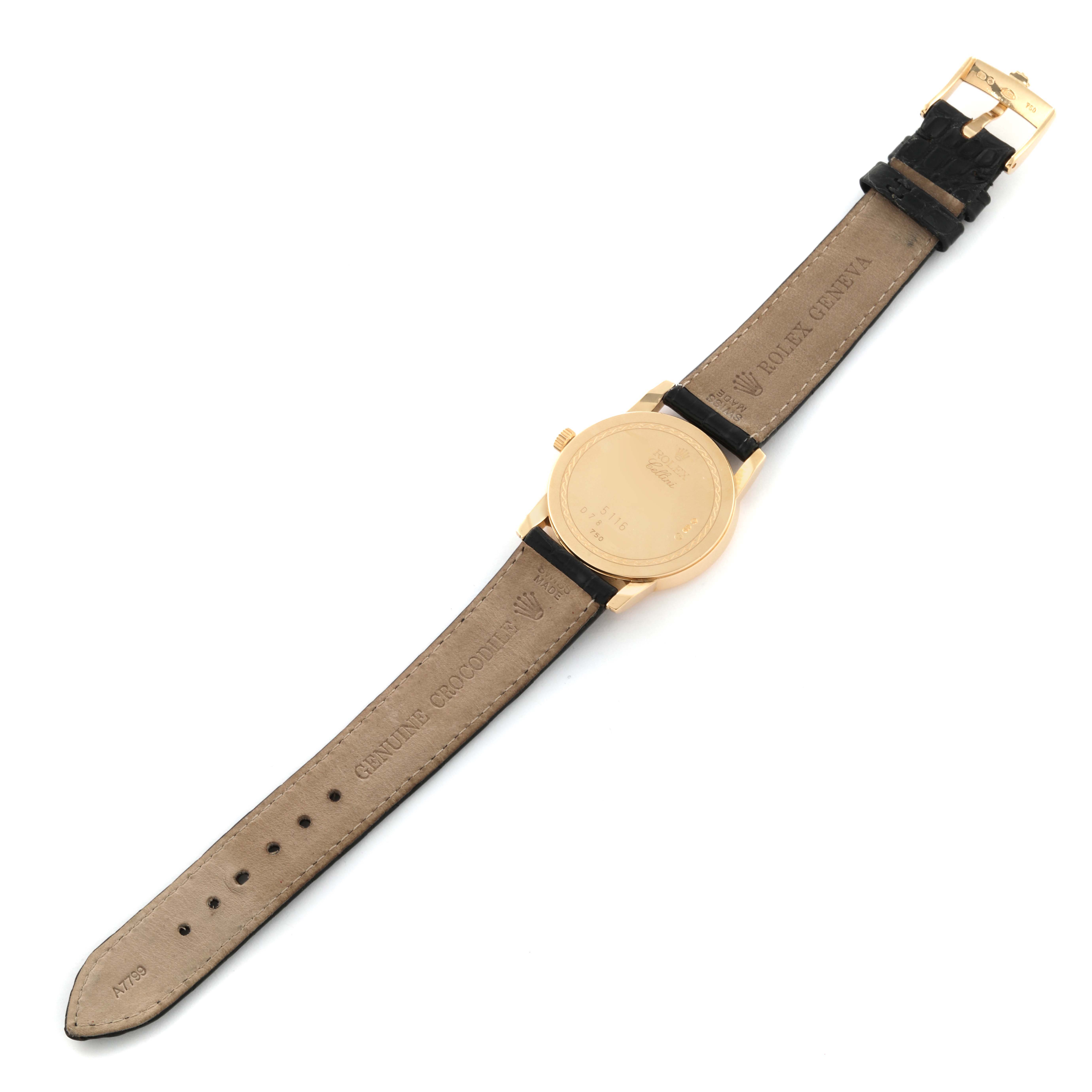 The image shows the back of a Rolex Cellini 5116 Men's Yellow Gold Champagne Dial 5116 Men's Yellow Gold Champagne Dial watch, highlighting the case back, strap, and buckle from a top-down angle.