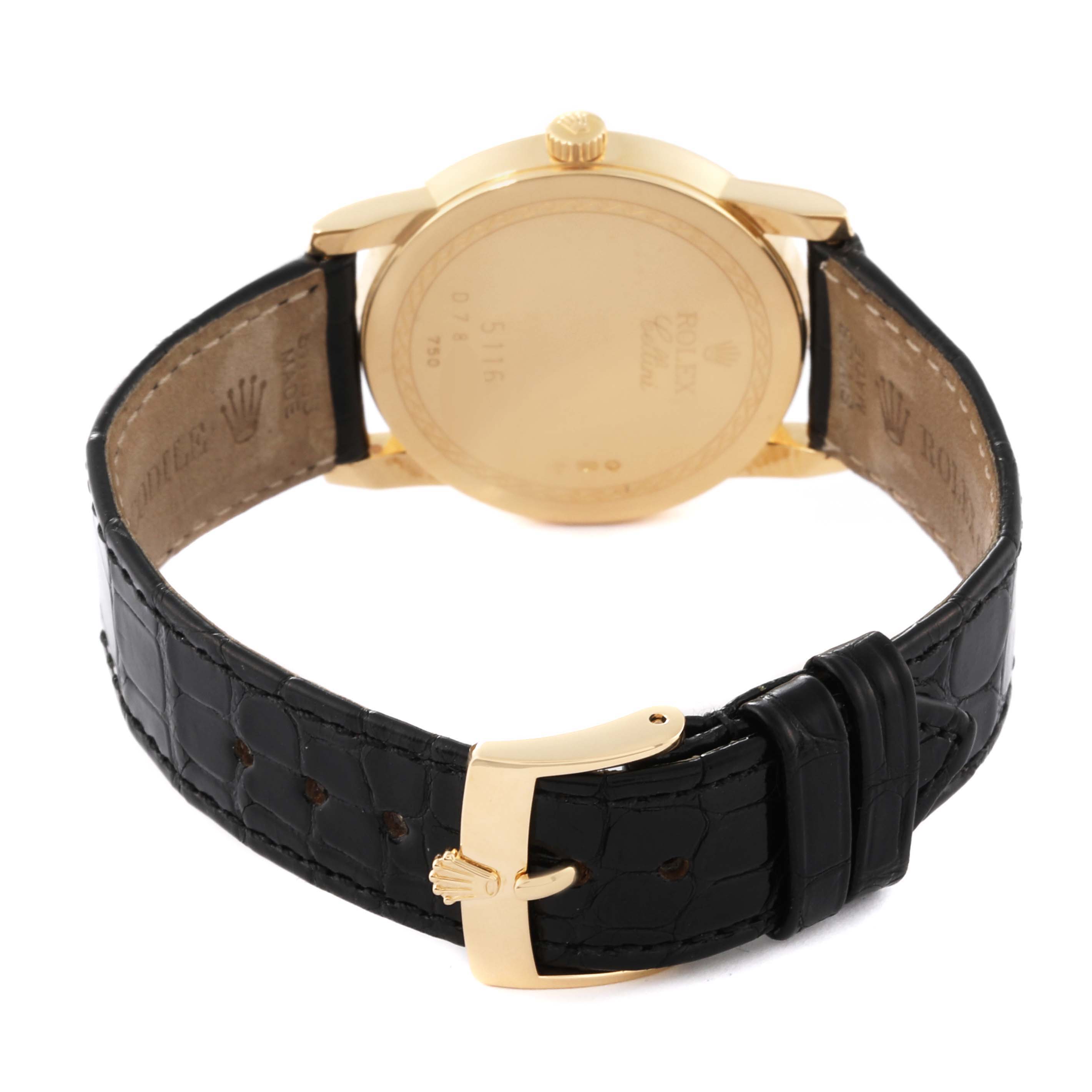 This image shows the back view of a Rolex Cellini 5116 Men's Yellow Gold Champagne Dial 5116 Men's Yellow Gold Champagne Dial model watch, featuring its gold case, crown, and black leather strap with a gold buckle.
