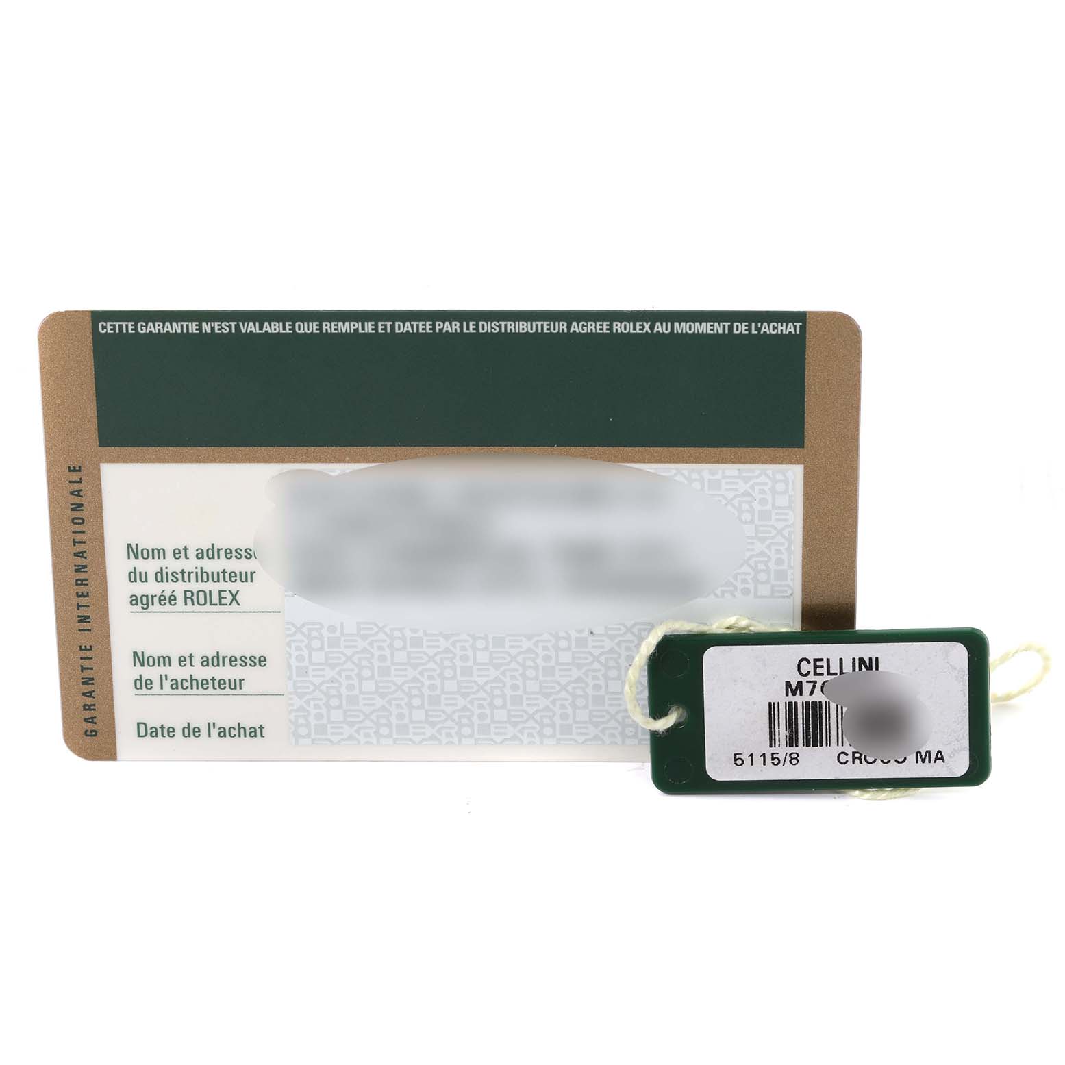 The image shows a Rolex Cellini 5115/8 Men's Yellow Gold White Dial 5115/8 Men's Yellow Gold White Dial model warranty card and an attached tag with a model number and barcode.