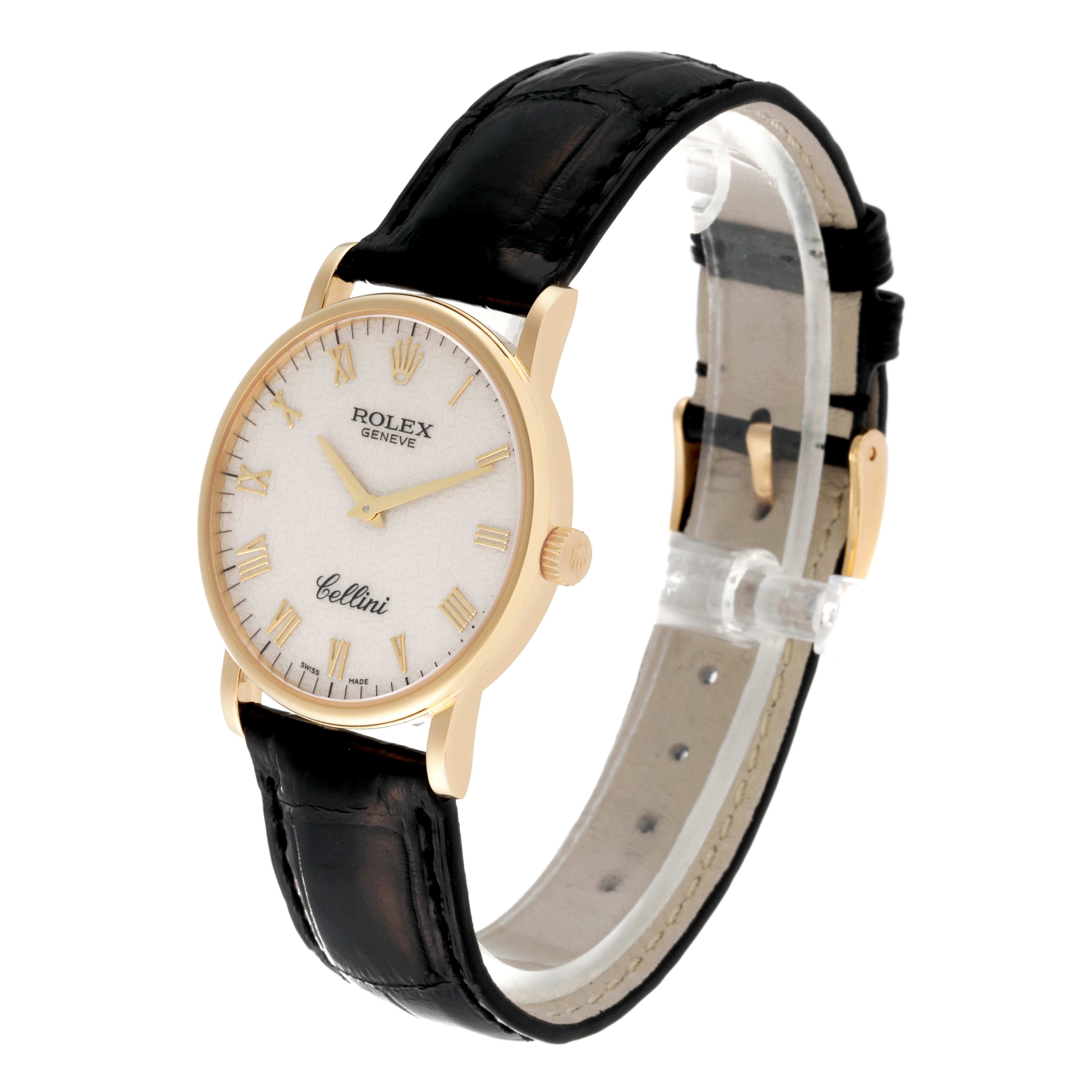 This image shows a Rolex Cellini 5115/8 Men's Yellow Gold White Dial 5115/8 Men's Yellow Gold White Dial watch at an angle displaying its face, gold casing, crown, and black leather strap.