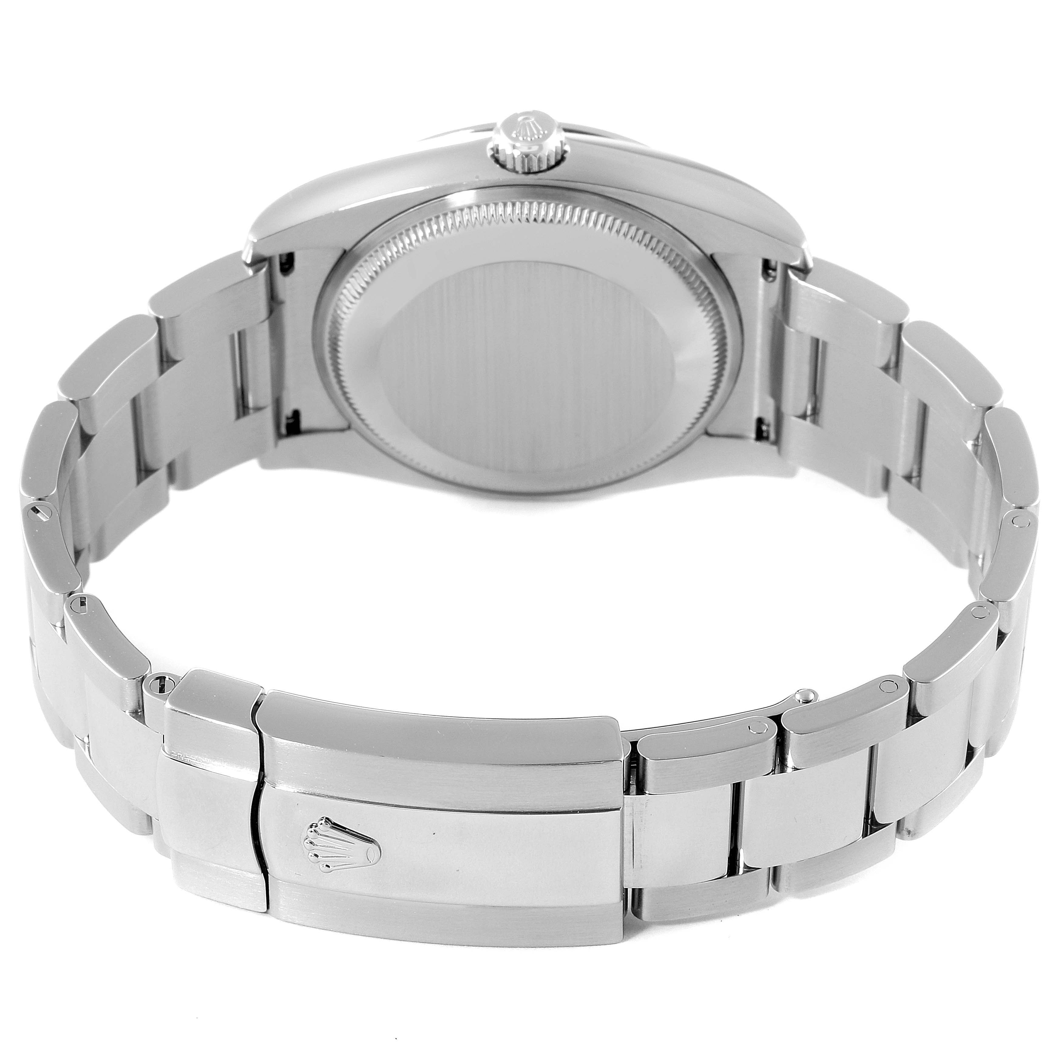 The image shows the back side and clasp of a Rolex Date 115200 Men's Stainless Steel Blue Dial 115200 Men's Stainless Steel Blue Dial model watch, highlighting the bracelet and case back.