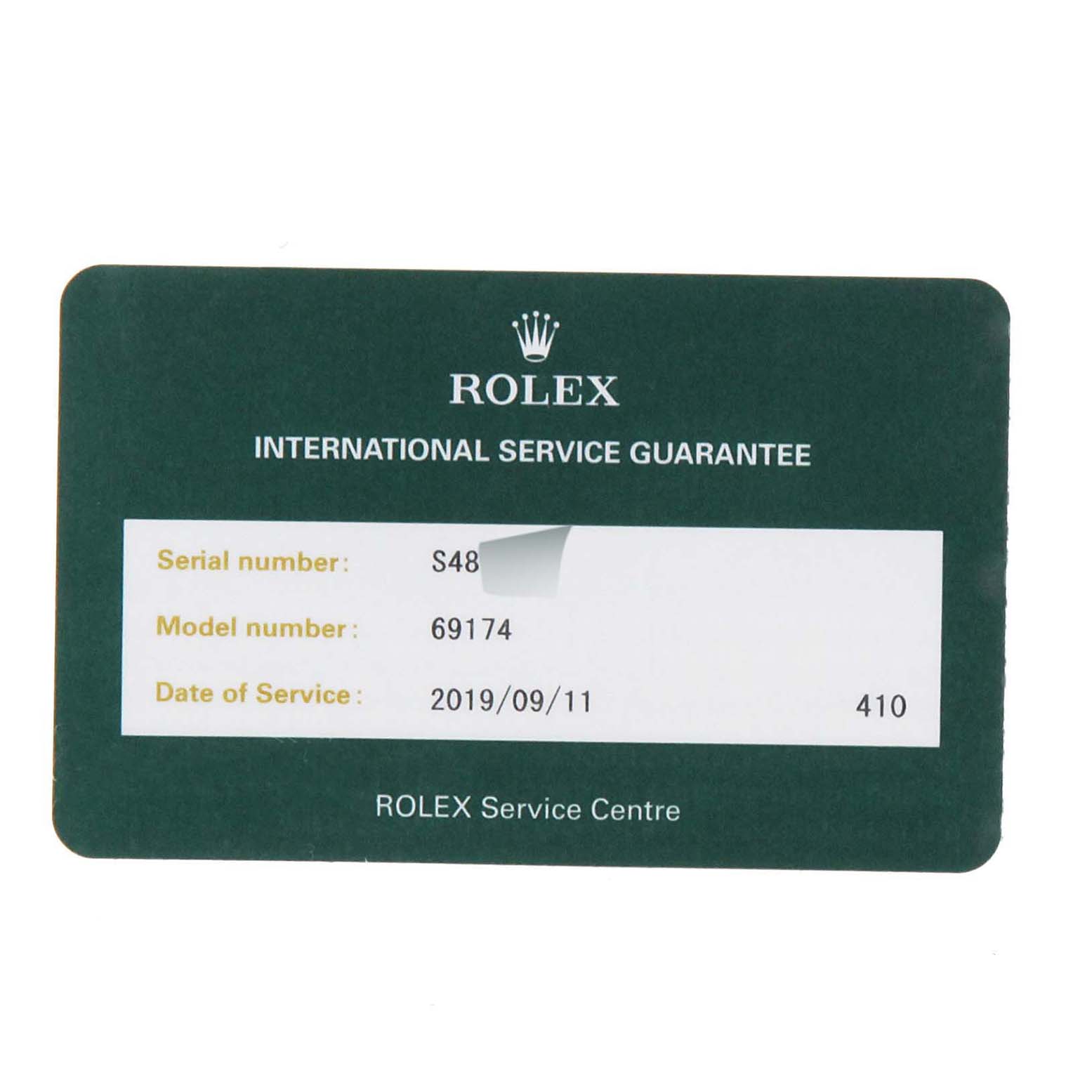 This image shows the front of an international service guarantee card for the Rolex Datejust 69174 Women
s Stainless Steel Blue Dial 69174 Women
s Stainless Steel Blue Dial model 69174.