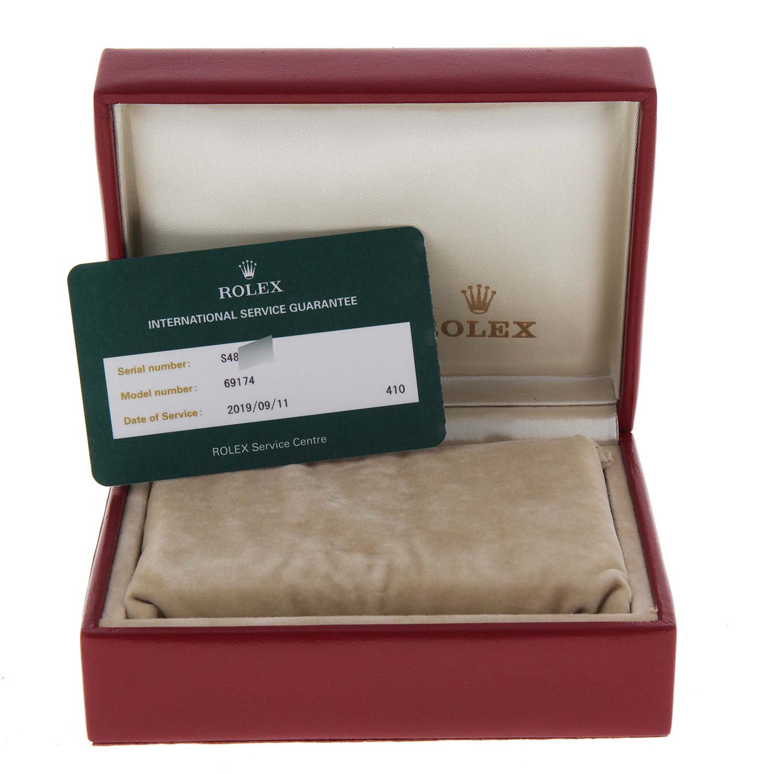 This image shows a Rolex Datejust 69174 Women
s Stainless Steel Blue Dial 69174 Women
s Stainless Steel Blue Dial box with the international service guarantee card inside.