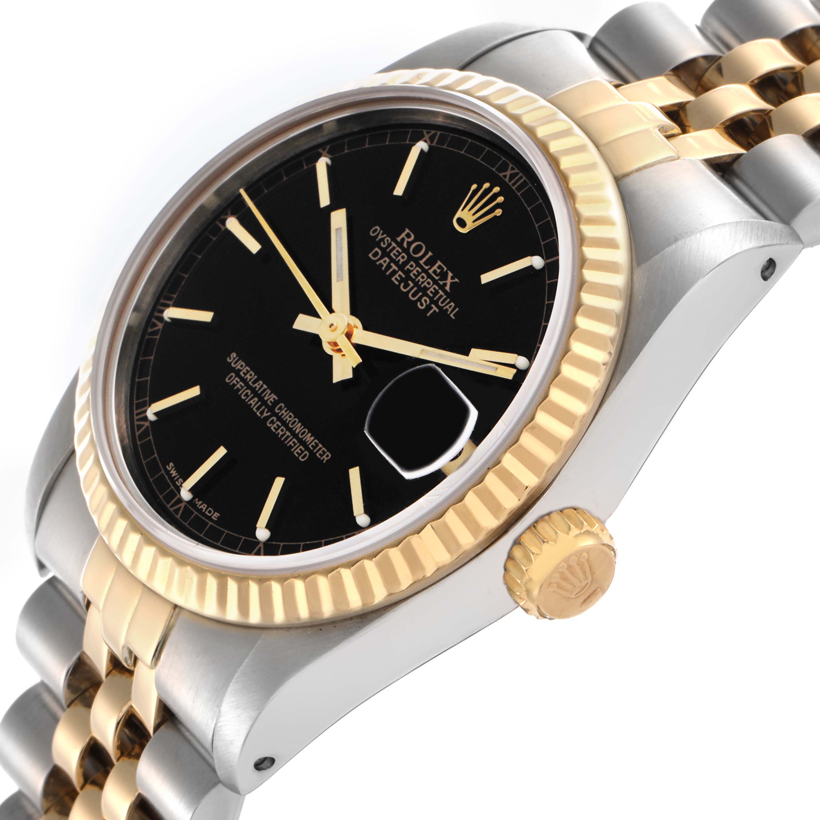 The Rolex Mid-Size 68273 Women
s Steel and Gold (two tone) Black Dial 68273 Women
s Steel and Gold (two tone) Black Dial watch is shown at an angled side view, highlighting its black dial, gold bezel, and crown.