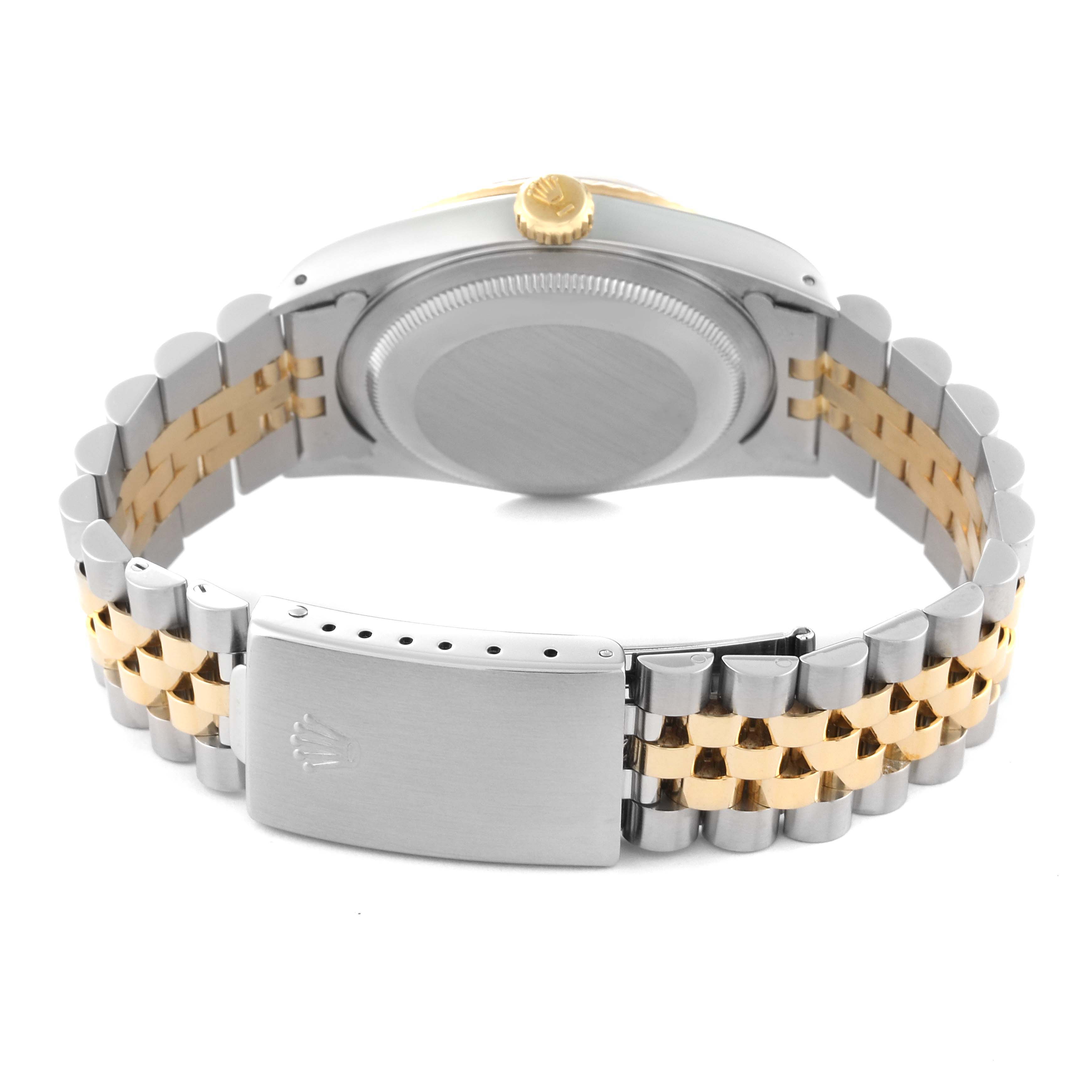 The image shows the rear view of a Rolex Datejust 16233 Men's Steel and Gold (two tone) Champagne Dial 16233 Men's Steel and Gold (two tone) Champagne Dial watch, highlighting its two-tone bracelet and clasp.