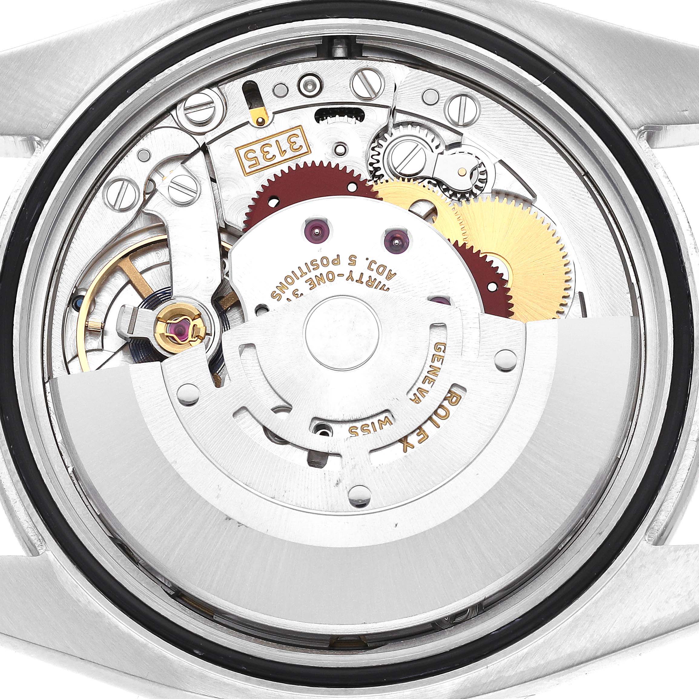 This image shows the inner mechanics and movement of a Rolex Datejust 116244 Men's Stainless Steel Blue Dial 116244 Men's Stainless Steel Blue Dial watch from a back angle.