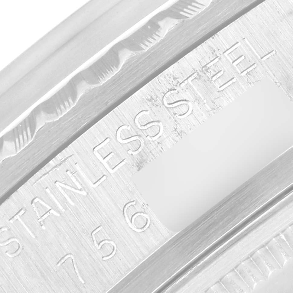 This close-up image shows the engraved stainless steel outer rim of the Rolex Vintage Collection 16030 Men's Stainless Steel Silver Dial 16030 Men's Stainless Steel Silver Dial model watch.
