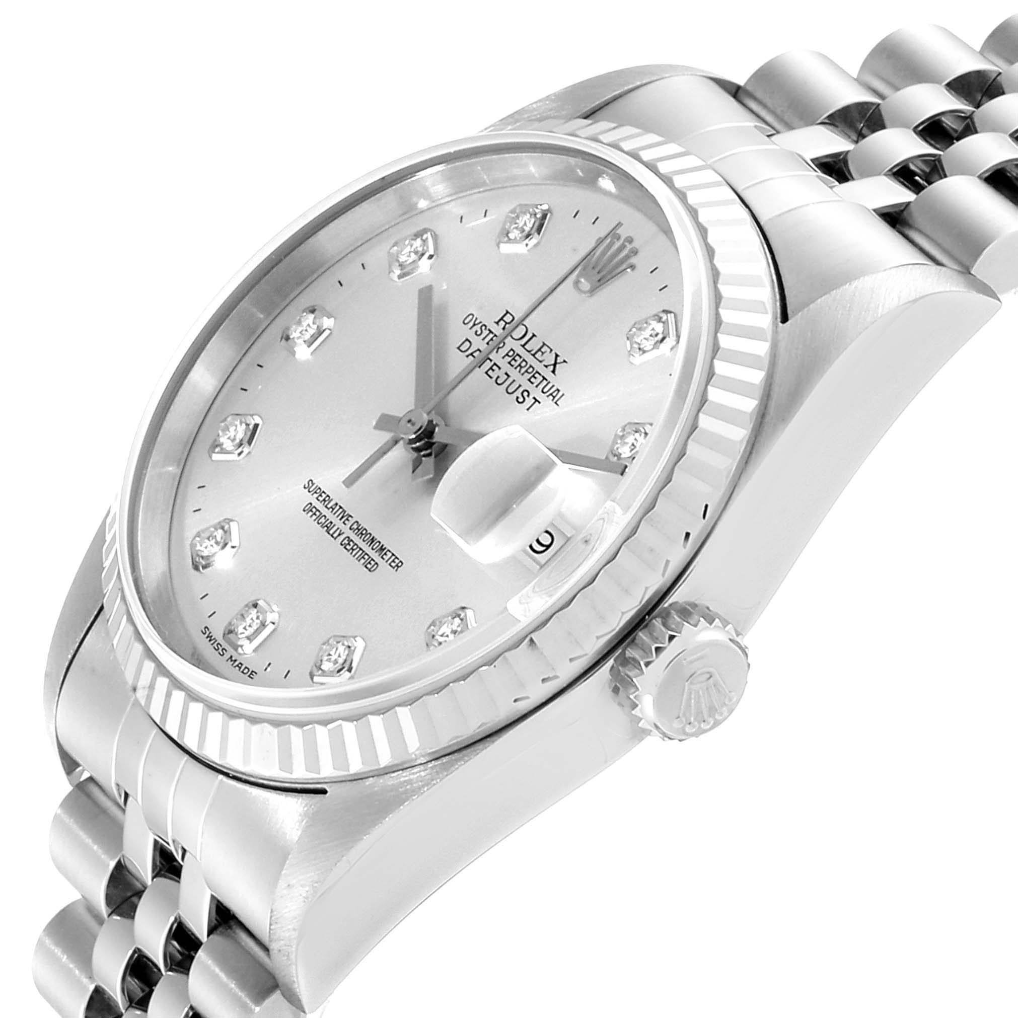 The image shows the Rolex Datejust 16234 Men's Stainless Steel Silver Dial 16234 Men's Stainless Steel Silver Dial watch at a tilted angle, highlighting the face, crown, bezel, and part of the bracelet.