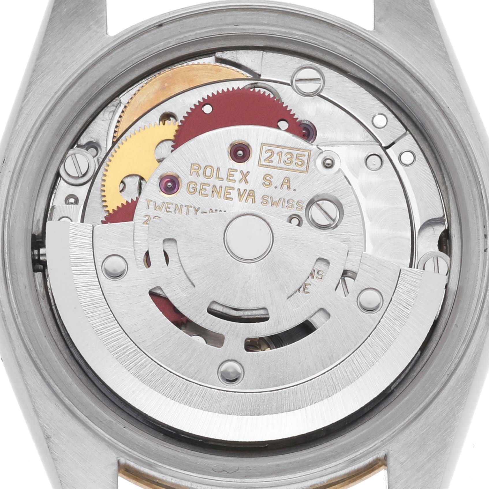 The image shows the movement and internal components of a Rolex Datejust 69173 Women
s Steel and Gold (two tone) Champagne Dial 69173 Women
s Steel and Gold (two tone) Champagne Dial watch from the back.