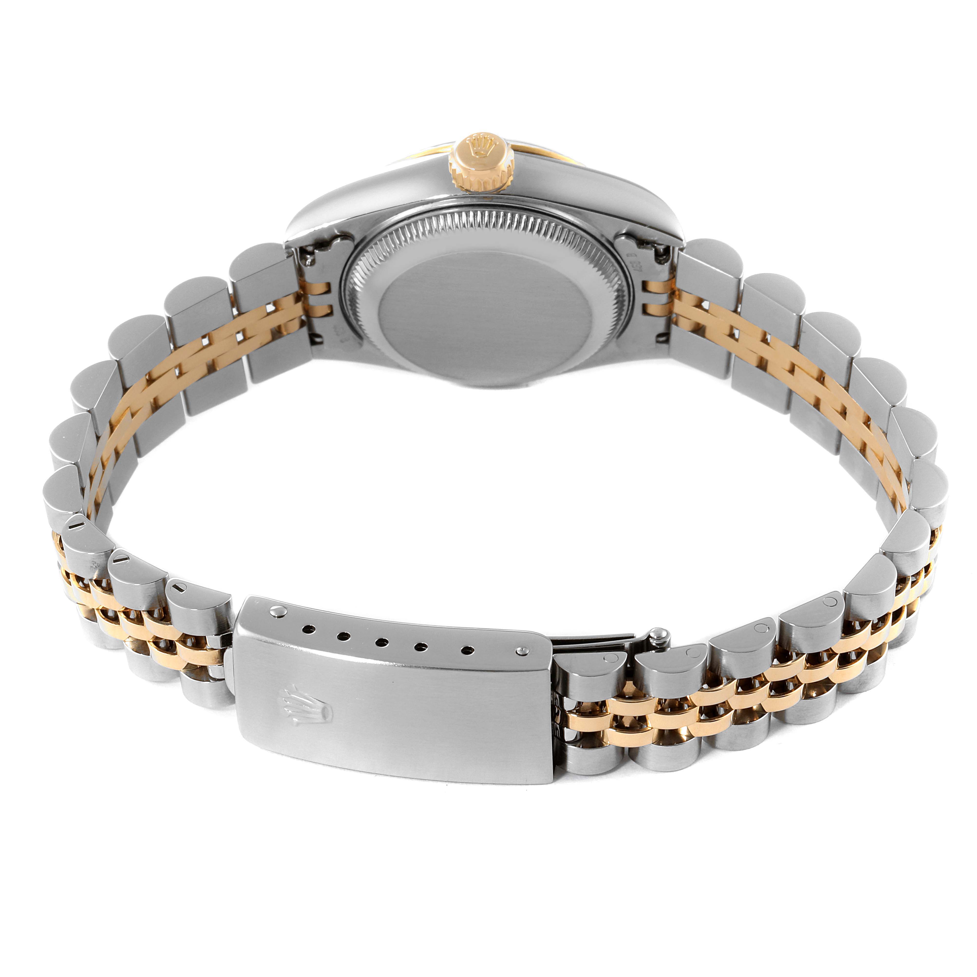 This Rolex Datejust 69173 Women's Stainless Steel Black Dial 69173 Women's Stainless Steel Black Dial watch is shown from the back, highlighting its case back, crown, and two-tone bracelet with clasp.