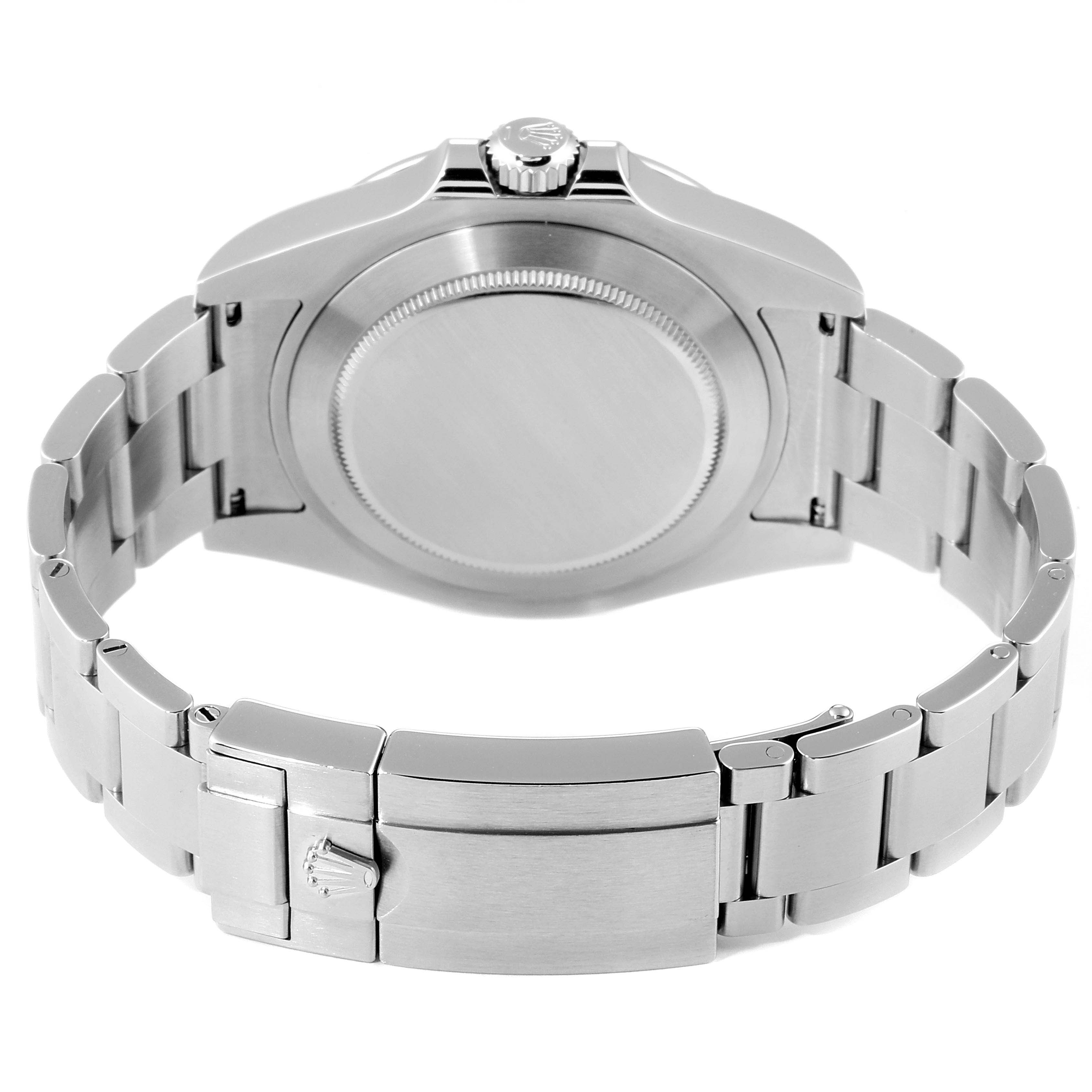 The image shows the back view of a Rolex Explorer 216570 Men
s Stainless Steel Black Dial 216570 Men
s Stainless Steel Black Dial watch, highlighting its clasp, bracelet, and caseback.