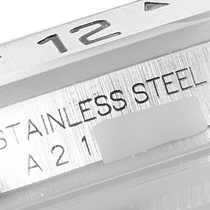 This image shows a close-up of the side engraving and part of the bezel of the Rolex Explorer 16570 Men
s Stainless Steel Black Dial 16570 Men
s Stainless Steel Black Dial model watch.