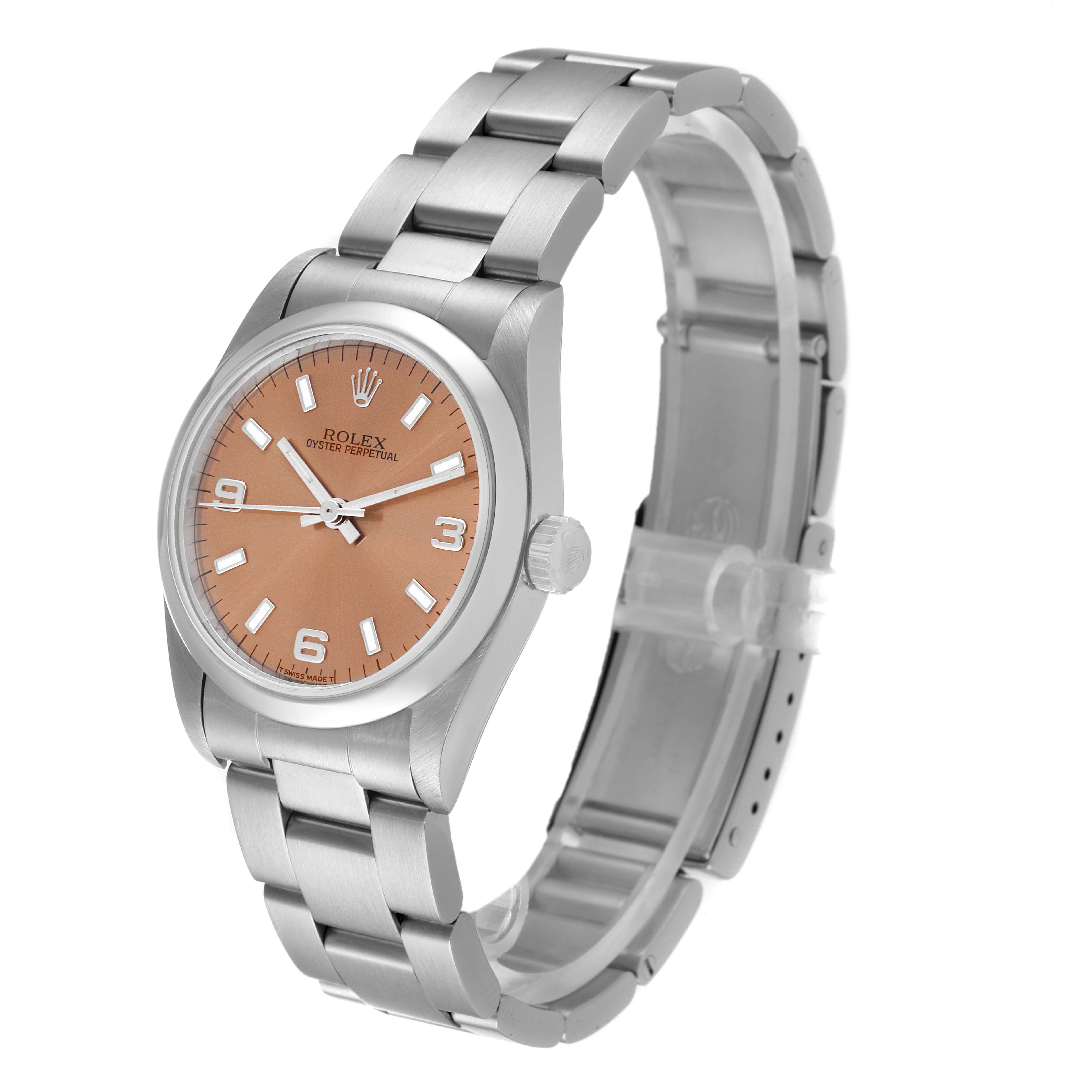 The Rolex Mid-Size 67480 Women
s Stainless Steel Pink Dial 67480 Women
s Stainless Steel Pink Dial watch is shown at an angled view, displaying the face, bezel, crown, and bracelet clearly.