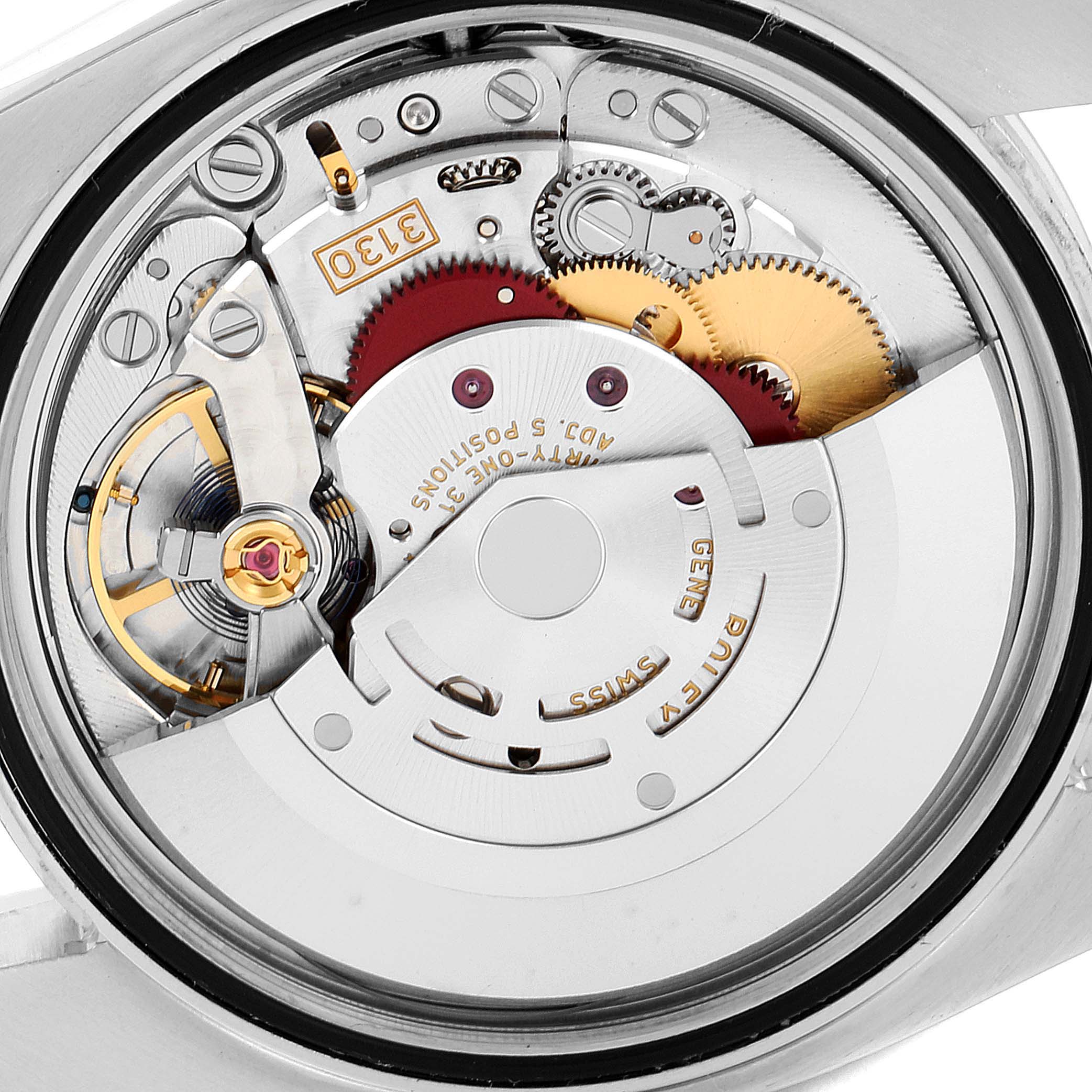 This image shows the internal mechanical movement of a Rolex Oyster Perpetual 116000 Men's Stainless Steel Blue Dial 116000 Men's Stainless Steel Blue Dial watch.