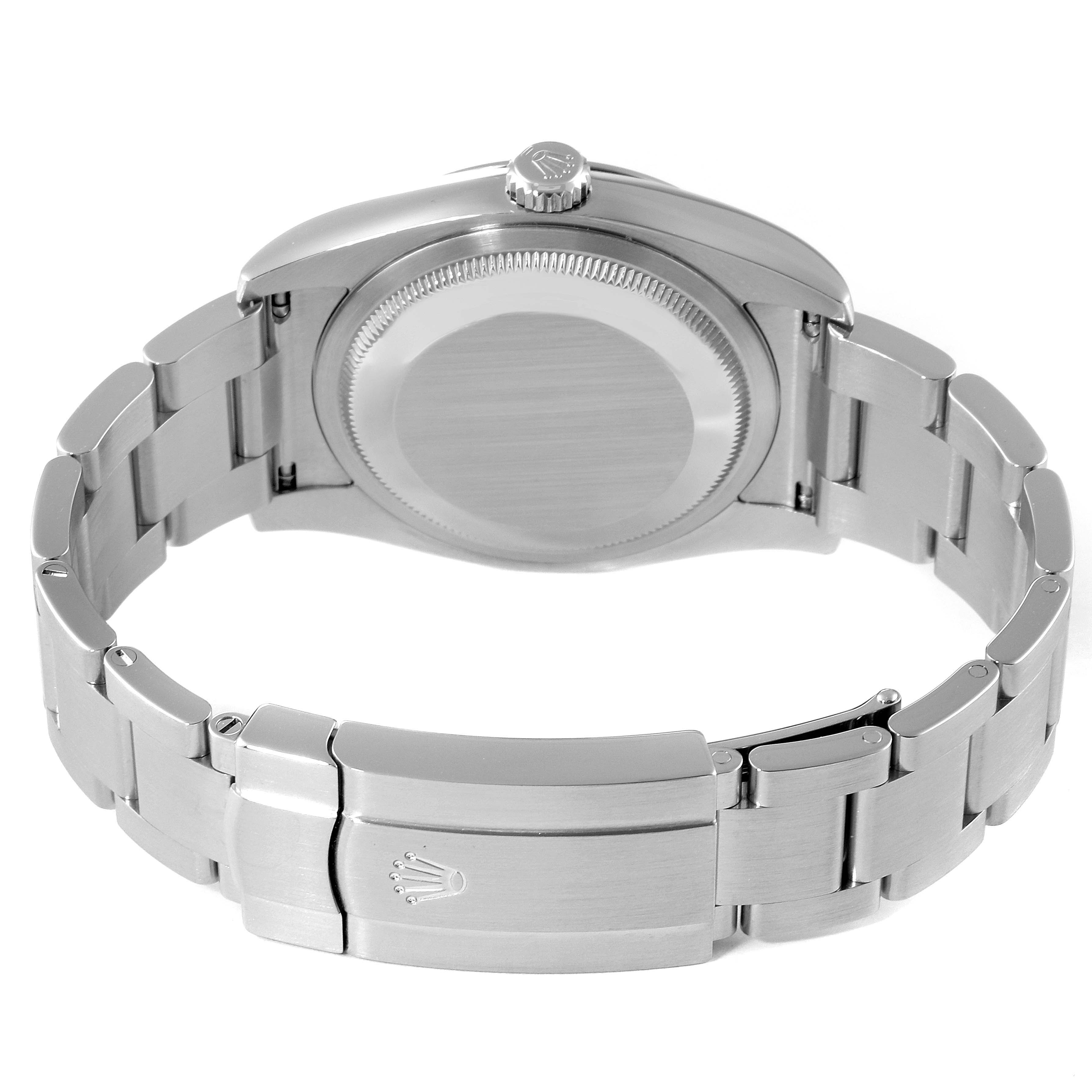 The image shows the back view of a Rolex Oyster Perpetual 116000 Men's Stainless Steel Blue Dial 116000 Men's Stainless Steel Blue Dial watch, highlighting the case back, crown, and bracelet with the clasp.