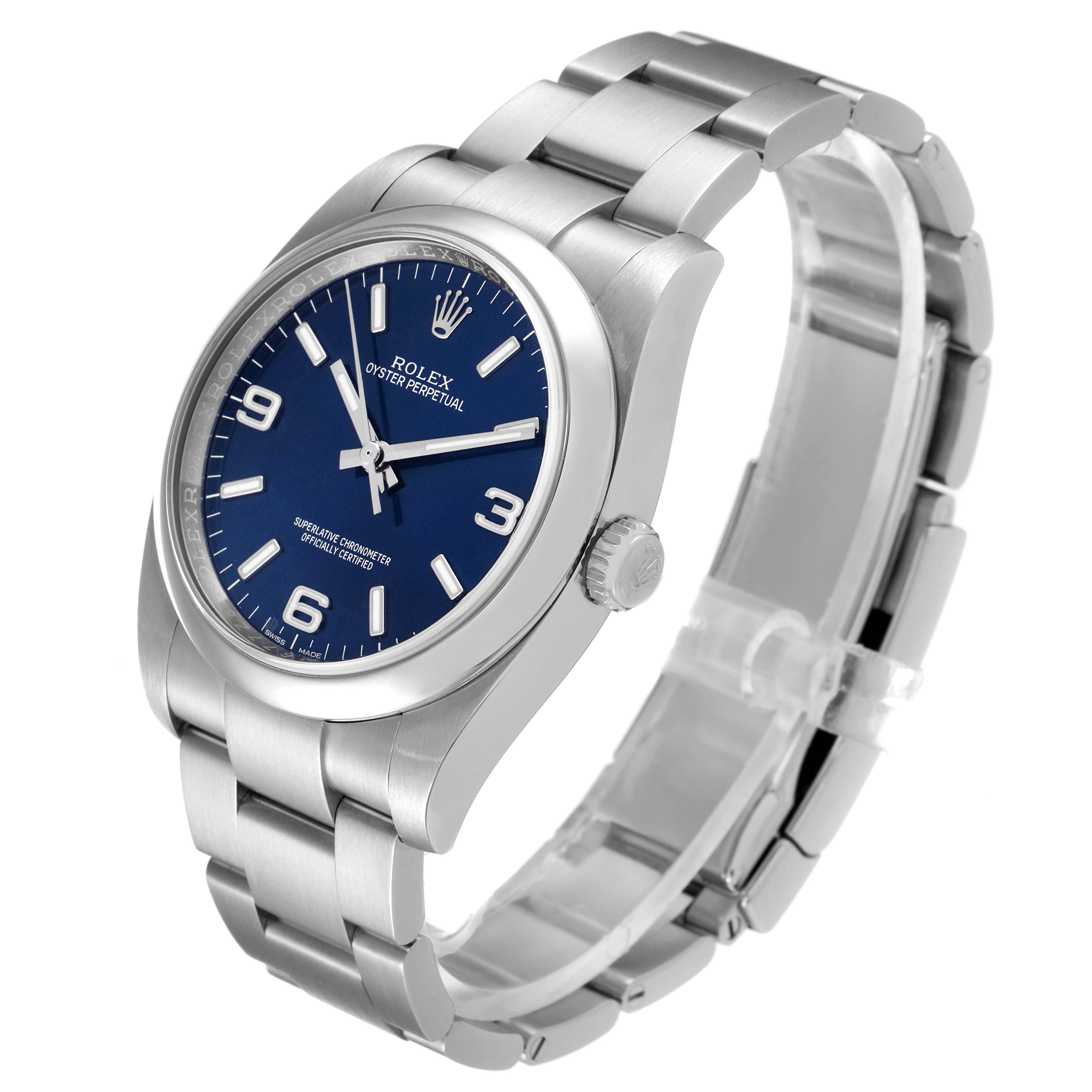 This Rolex Oyster Perpetual 116000 Men's Stainless Steel Blue Dial 116000 Men's Stainless Steel Blue Dial watch is shown at an angled side view, highlighting the blue dial, case, crown, and bracelet.