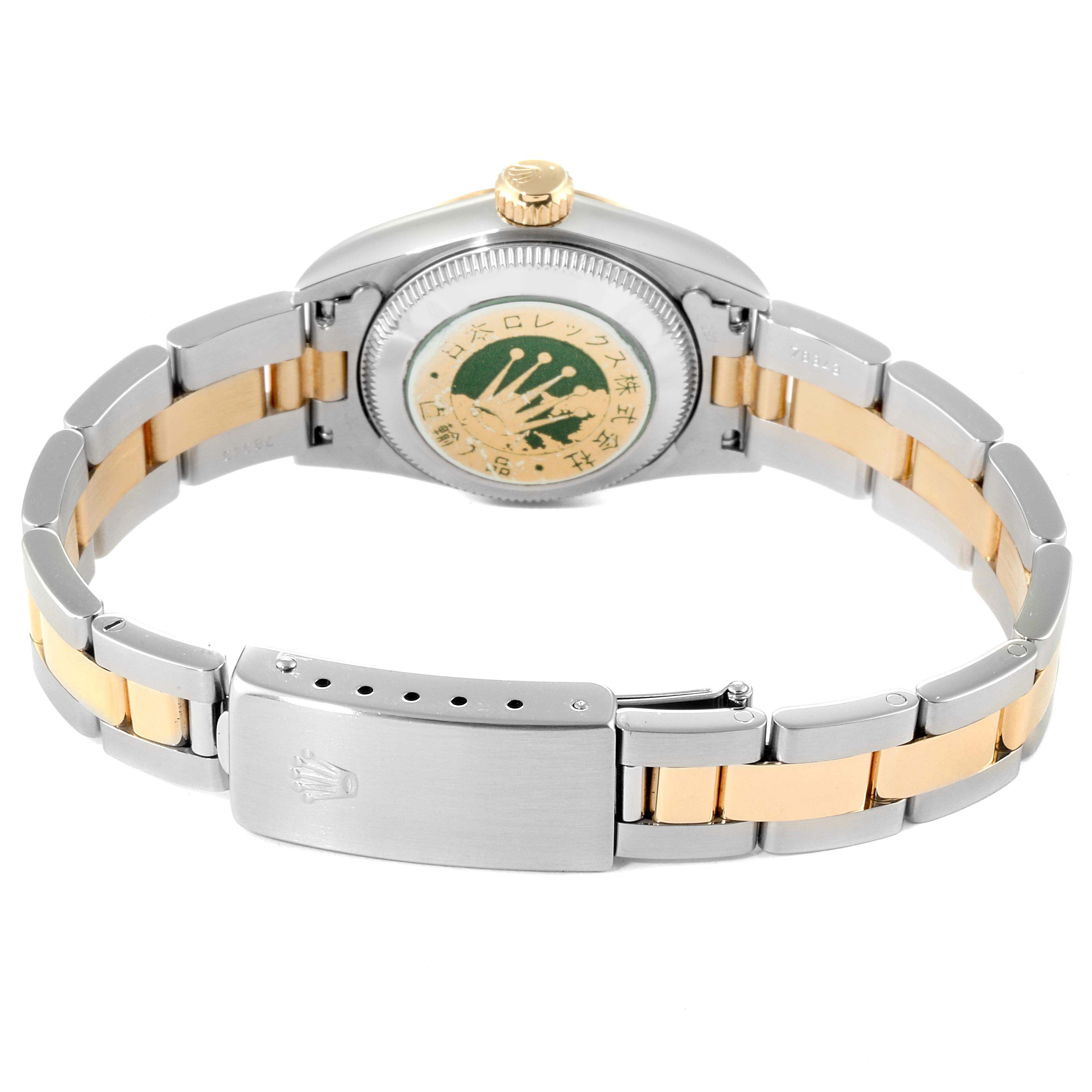 The image shows the back of the Rolex Oyster Perpetual 67183 Women's Steel and Gold (two tone) Grey Dial 67183 Women's Steel and Gold (two tone) Grey Dial watch, highlighting its bracelet and clasp.