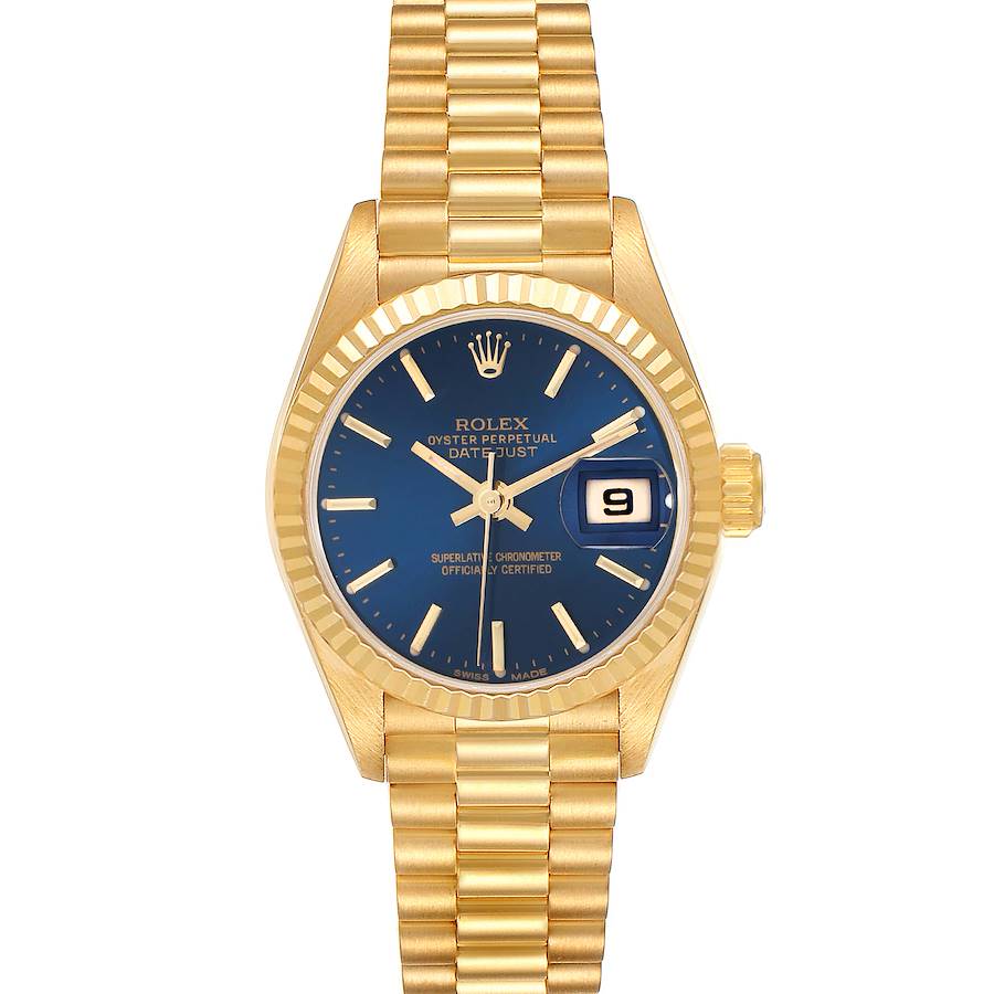 The Rolex President model is shown from the front, displaying the blue dial, gold bezel, and bracelet.