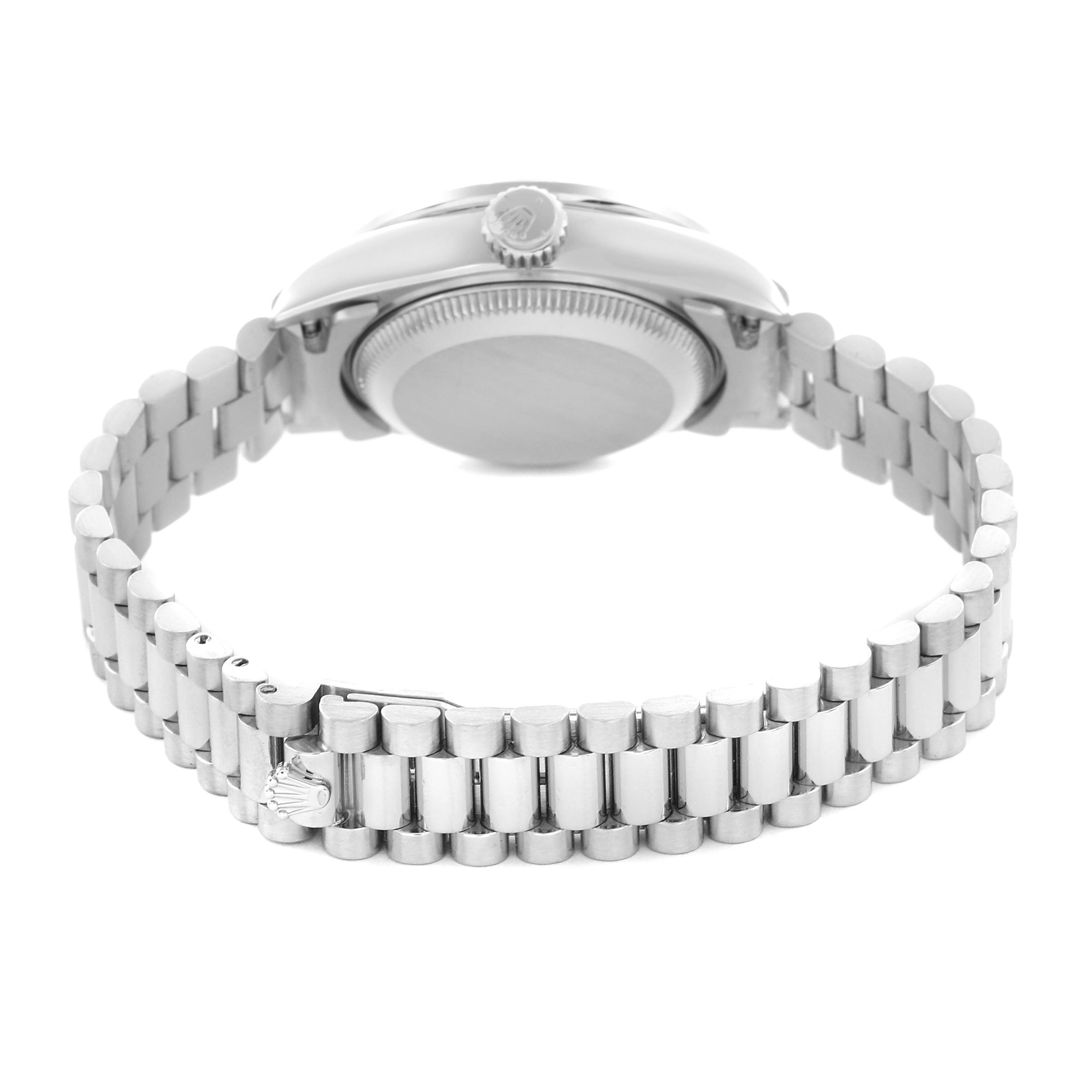 The image shows the side and back view of a Rolex President 69136 Women
s Platinum Silver Dial 69136 Women
s Platinum Silver Dial watch, highlighting the bracelet and case back.