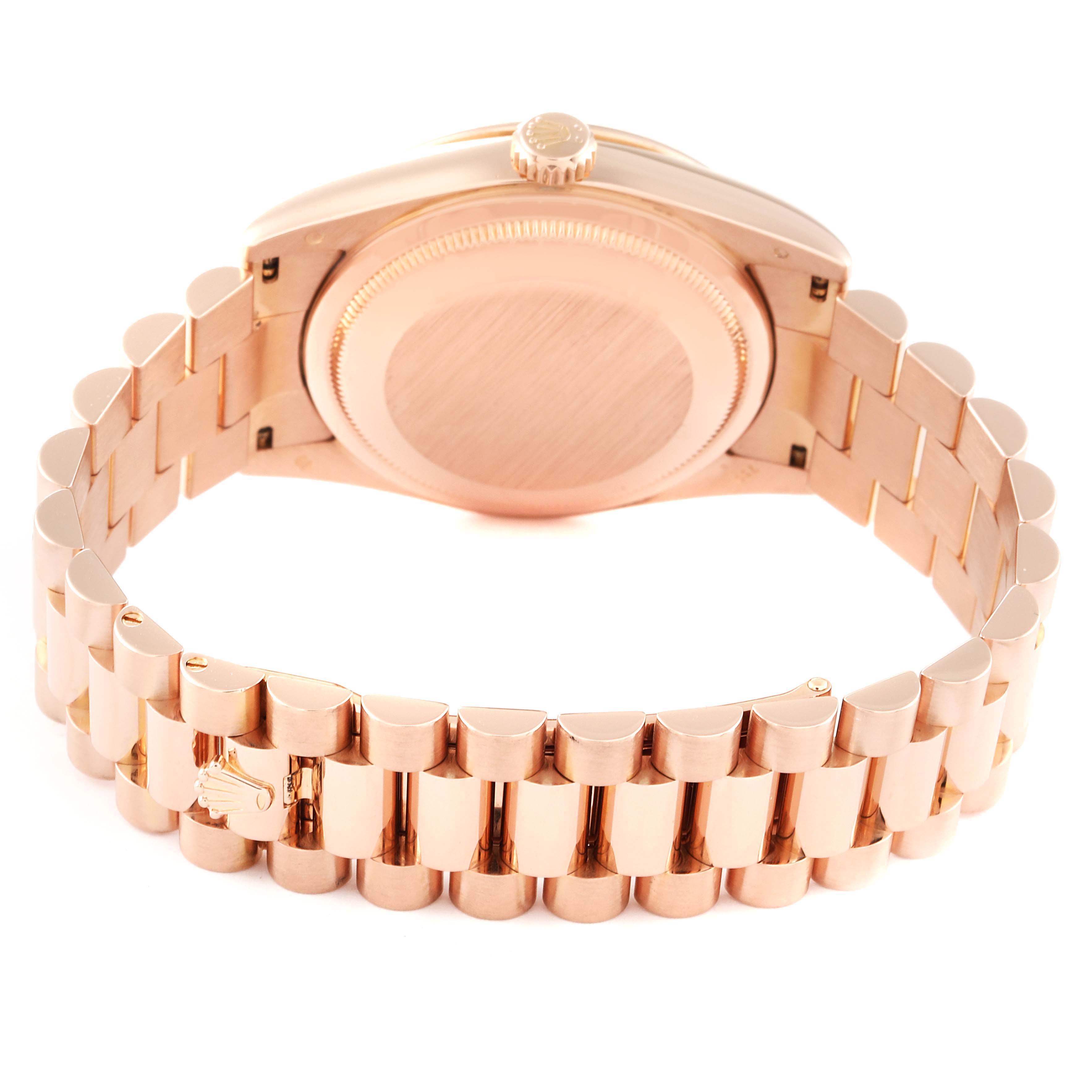 This image shows the back case and bracelet of a Rolex President 118235 Men's Rose Gold Pink Dial 118235 Men's Rose Gold Pink Dial model watch from a rear angle.