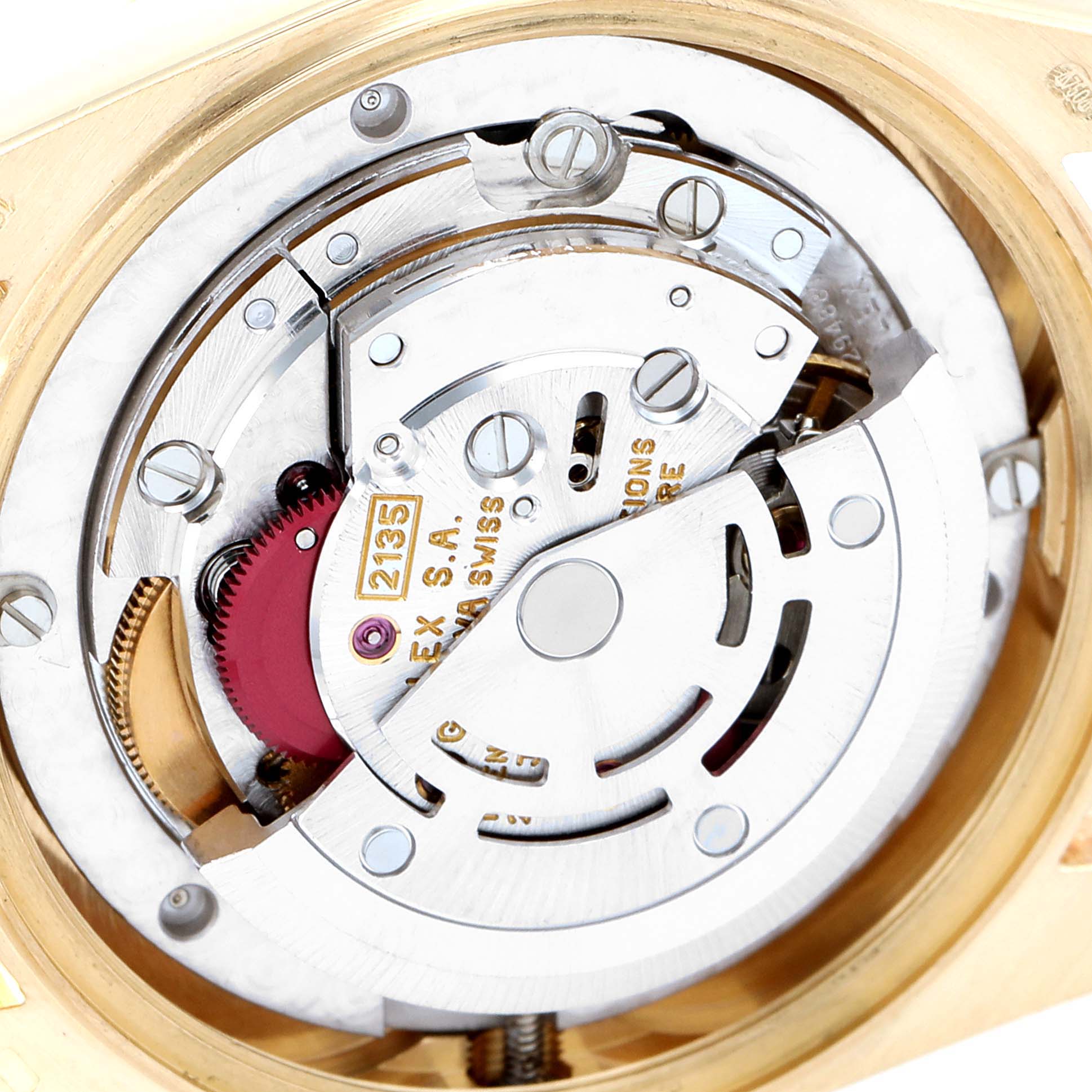 The image shows a close-up view of the movement mechanism inside a Rolex President 68158 Women
s Yellow Gold Champagne Dial 68158 Women
s Yellow Gold Champagne Dial model watch.