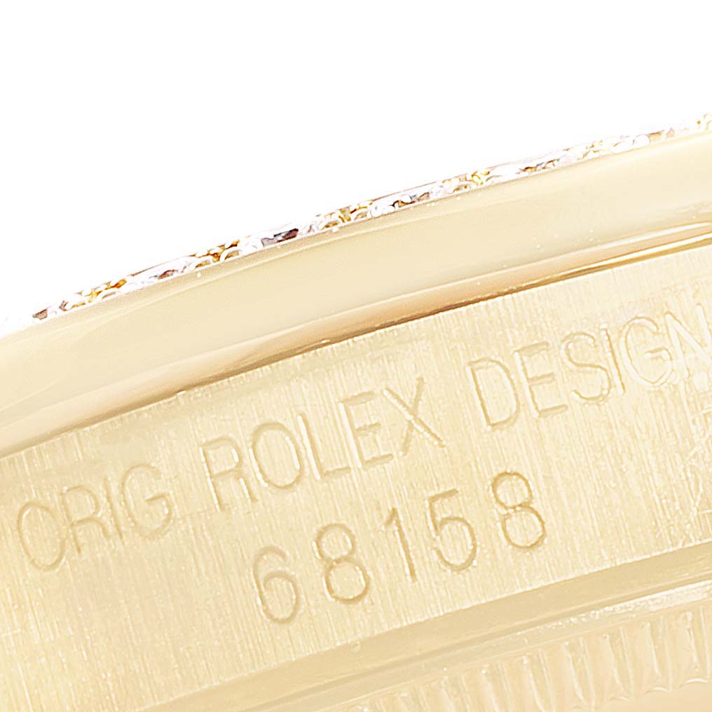 The image shows a close-up of the side of a Rolex President 68158 Women
s Yellow Gold Champagne Dial 68158 Women
s Yellow Gold Champagne Dial model, highlighting the engraving with the serial number "68158".