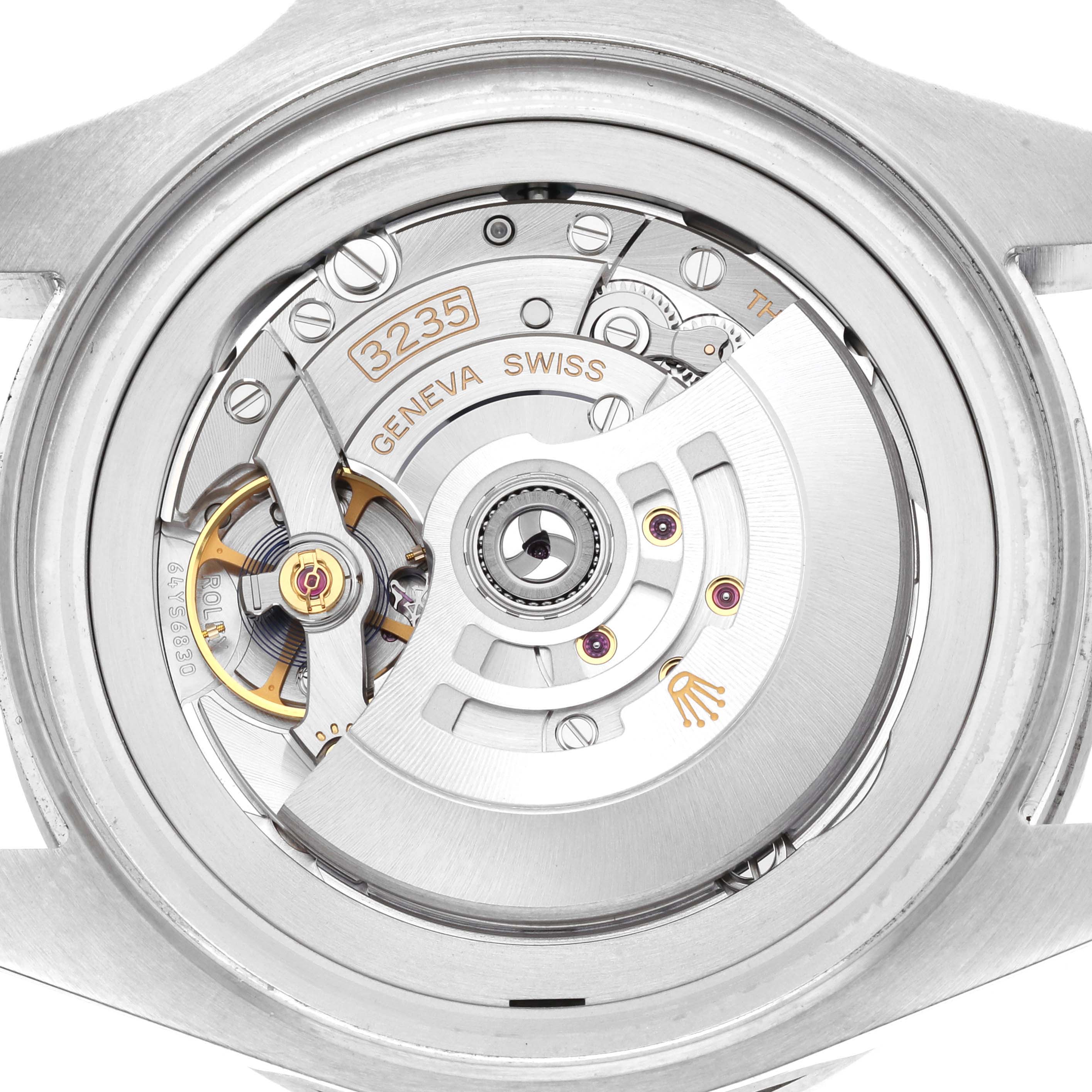 This is a close-up shot of the Rolex Sea-Dweller 126660 Men
s Stainless Steel Black Dial 126660 Men
s Stainless Steel Black Dial showcasing the intricate details of its movement
s mechanism.