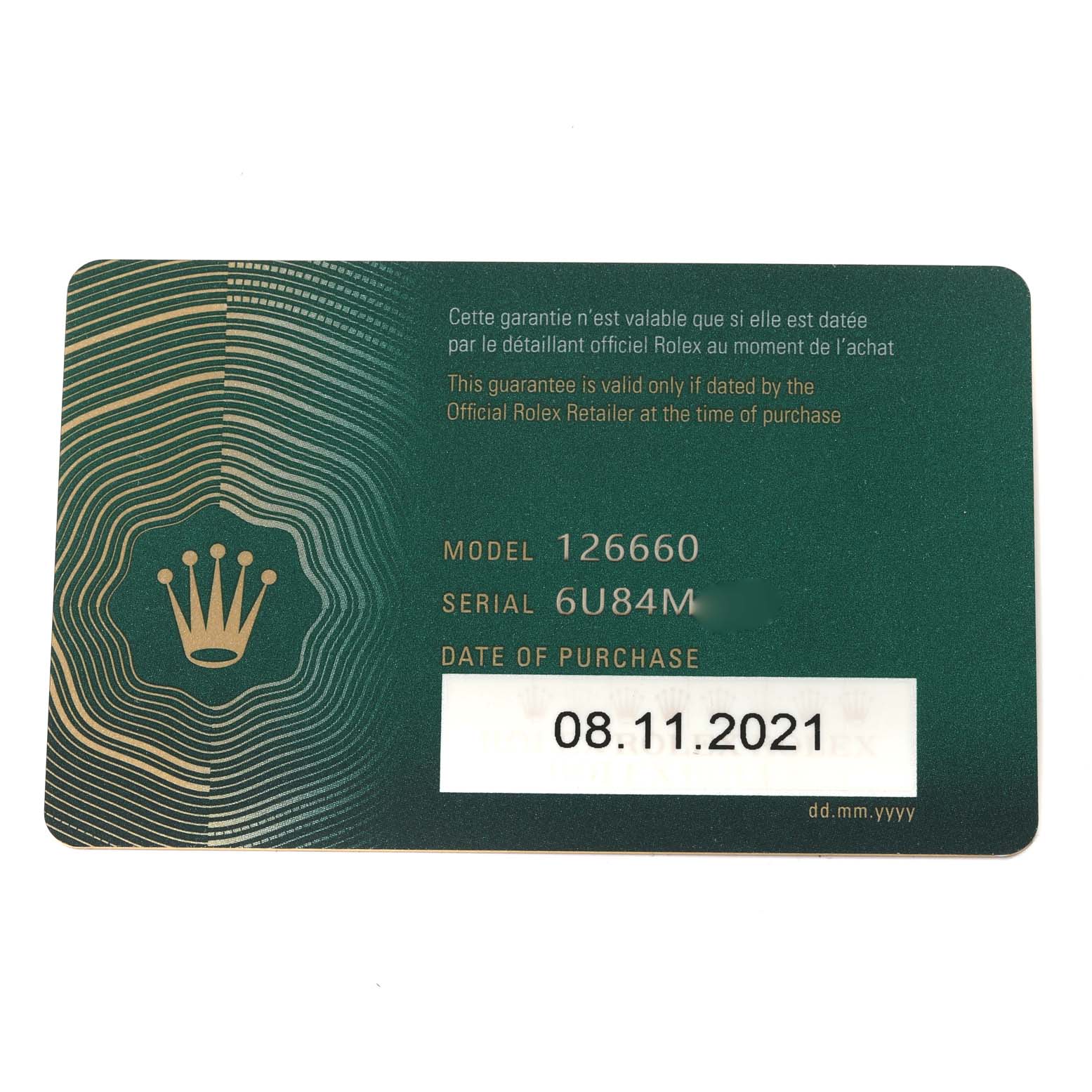 This is a warranty card for the Rolex Sea-Dweller 126660 Men
s Stainless Steel Black Dial 126660 Men
s Stainless Steel Black Dial model 126660, showing the model number, serial number, and purchase date.