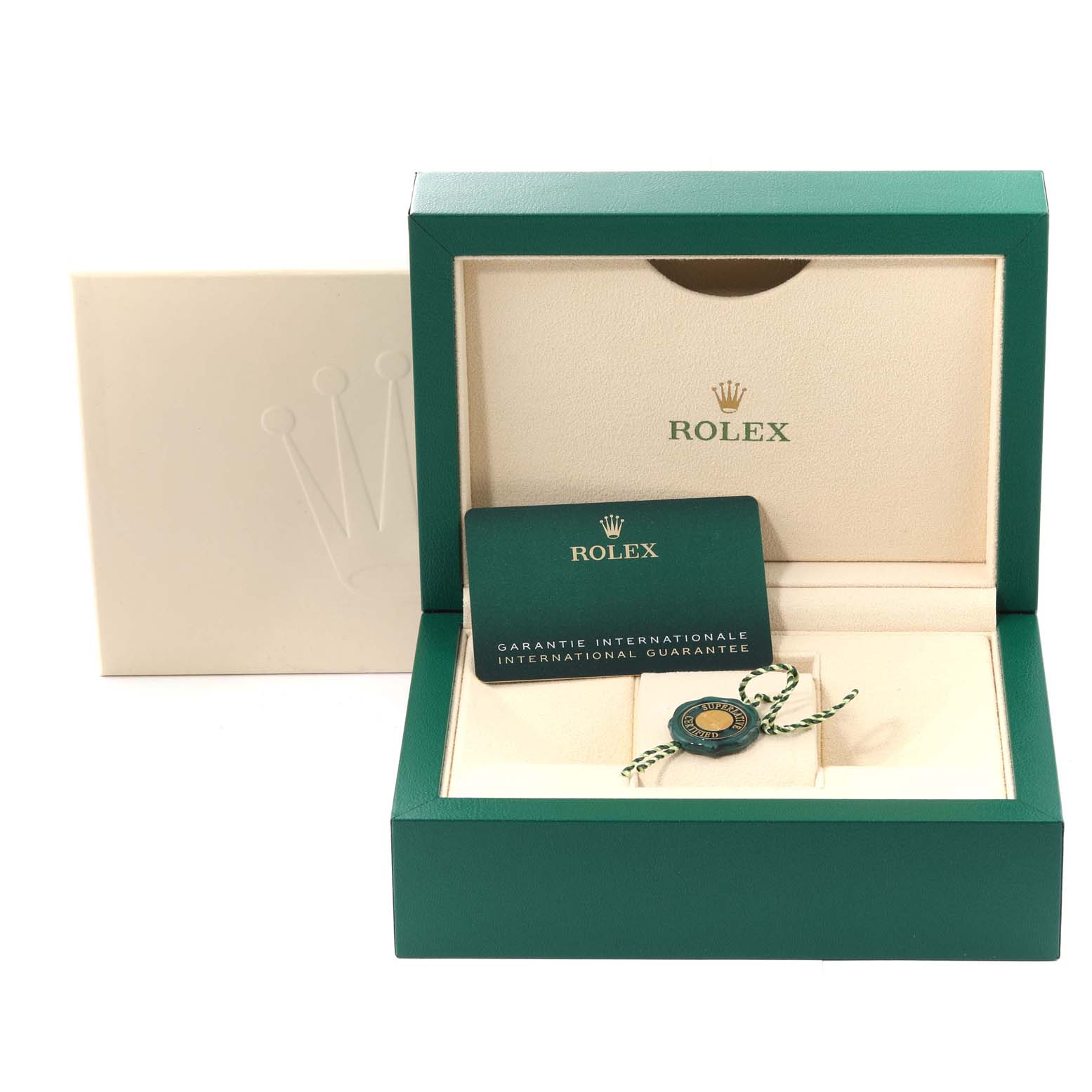 This image shows an open box for a Rolex Sea-Dweller 126660 Men
s Stainless Steel Black Dial 126660 Men
s Stainless Steel Black Dial watch, displaying a guarantee card and a tag inside.