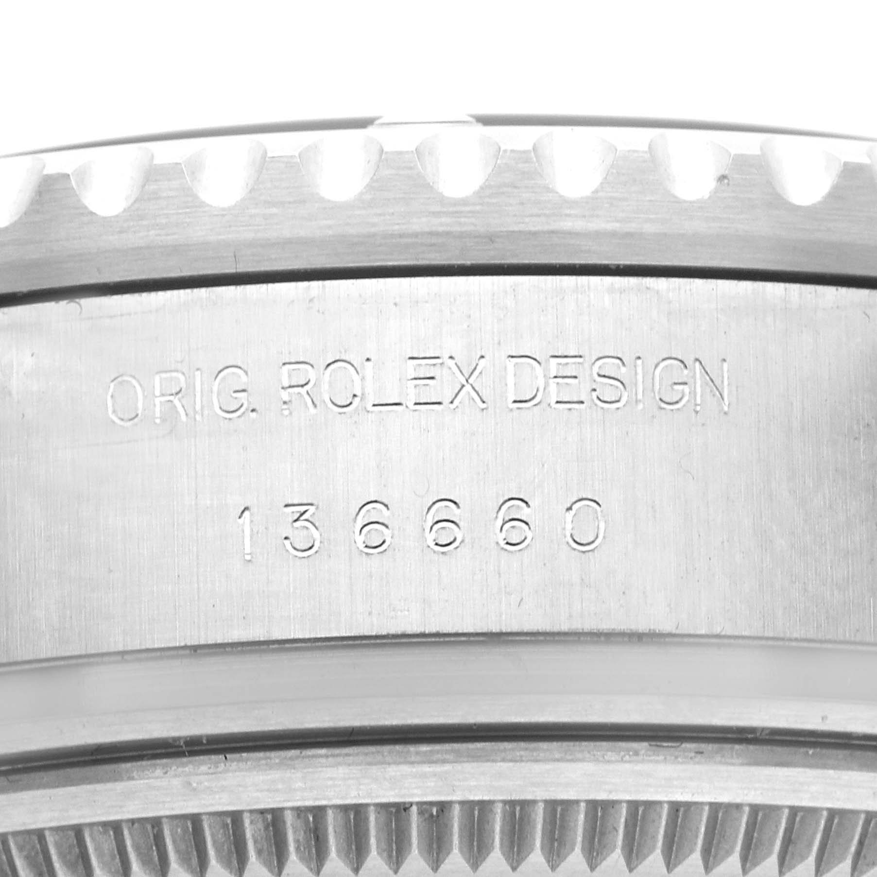 The image shows a close-up of the side engraving on a Rolex Sea-Dweller 136660 Men
s Stainless Steel Black Dial 136660 Men
s Stainless Steel Black Dial
s case, featuring the model number and design details.