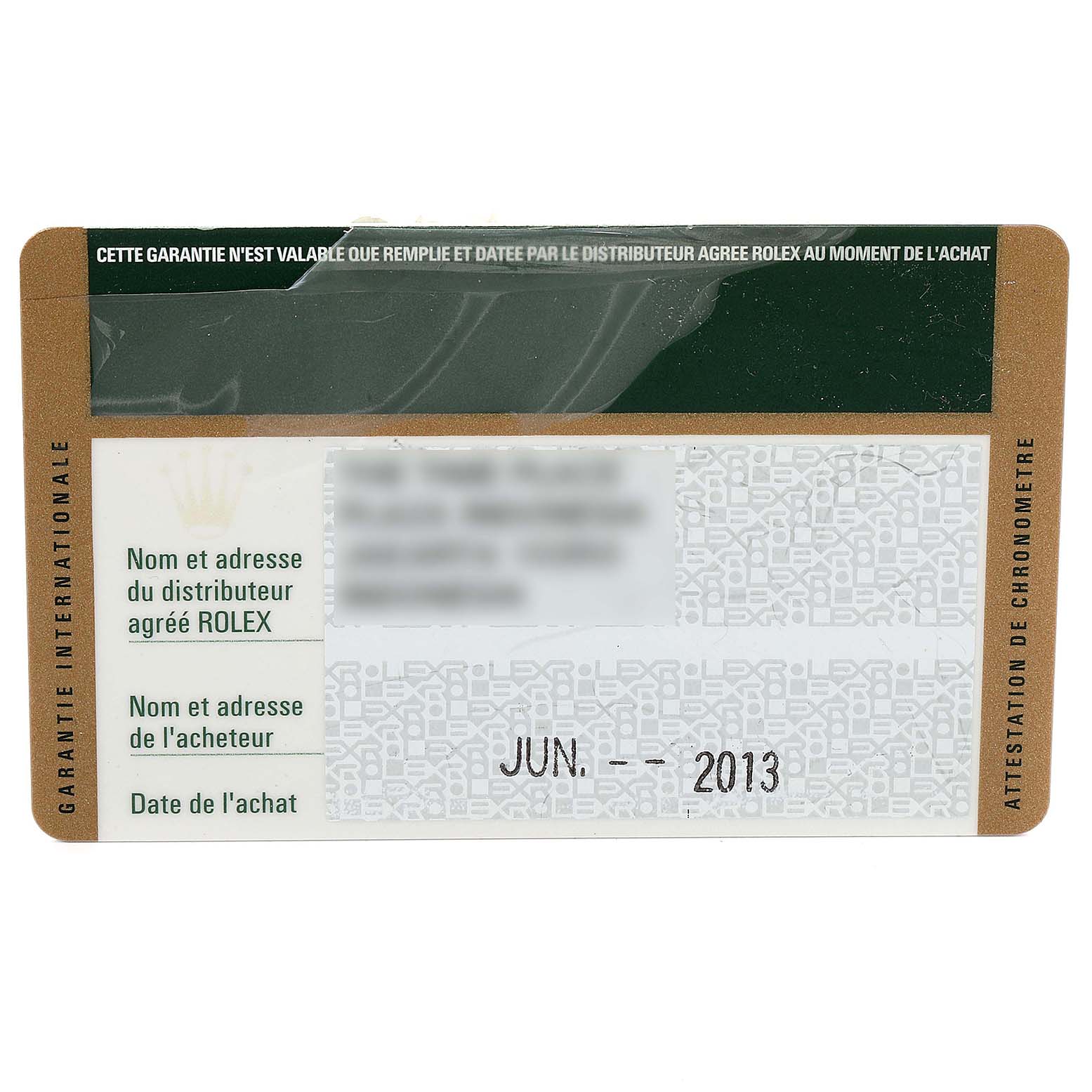 This image shows a warranty card for a Rolex Submariner 114060 Men
s Stainless Steel Black Dial 114060 Men
s Stainless Steel Black Dial watch, featuring dealer and purchase date details.